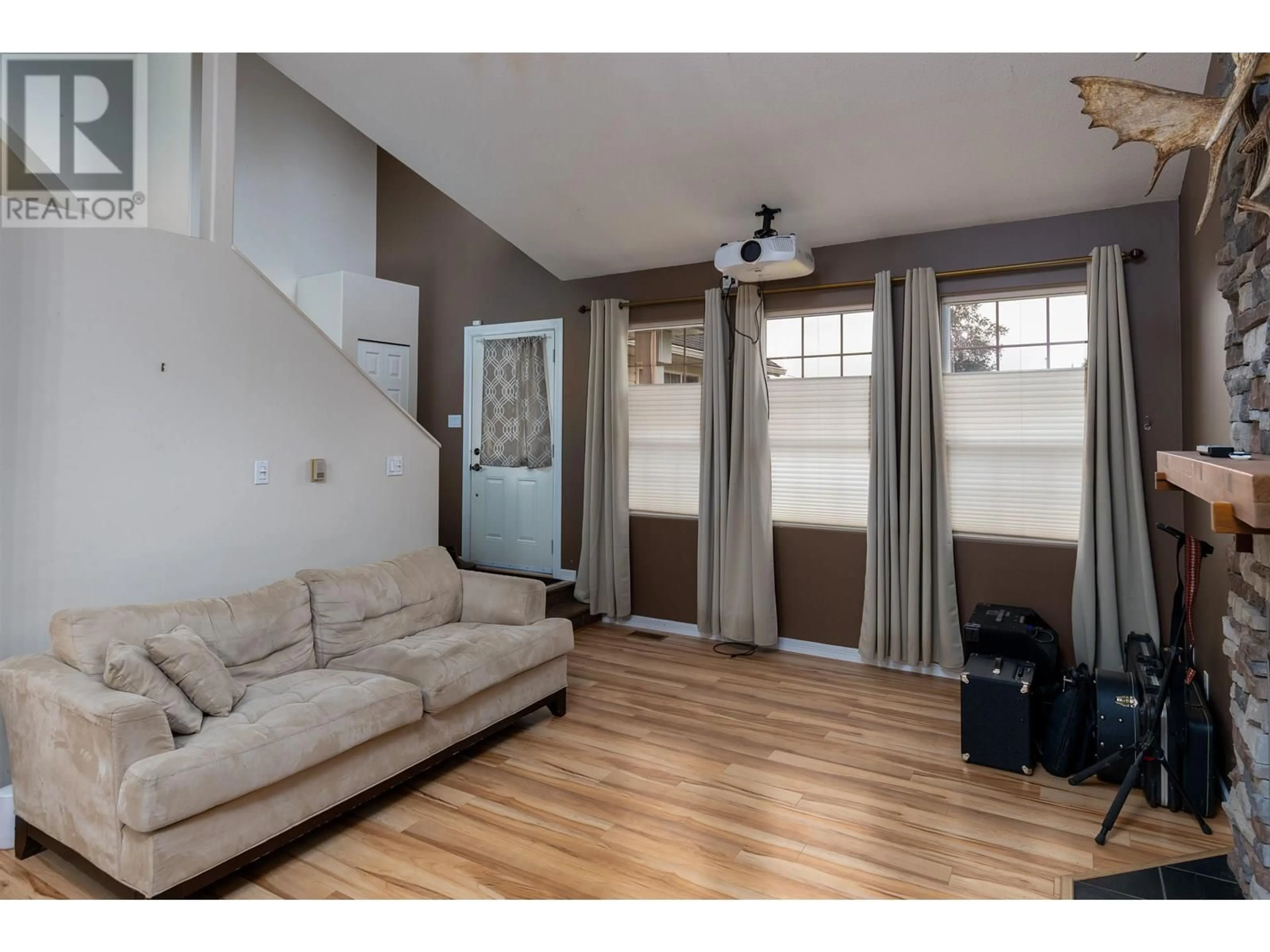 Living room with furniture, wood/laminate floor for 2084 WALNUT DRIVE, Terrace British Columbia V8G5E9