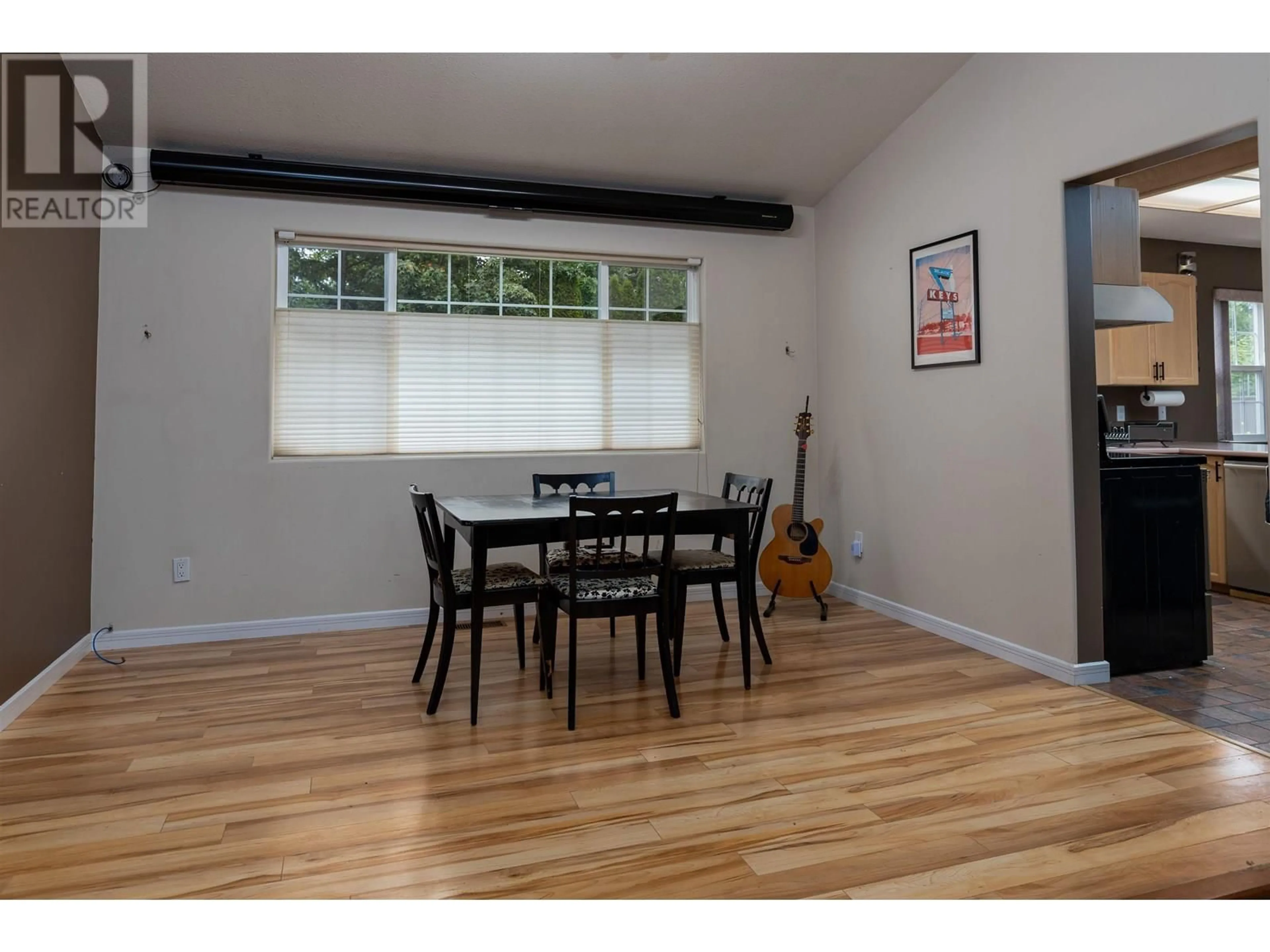 Dining room, wood/laminate floor for 2084 WALNUT DRIVE, Terrace British Columbia V8G5E9