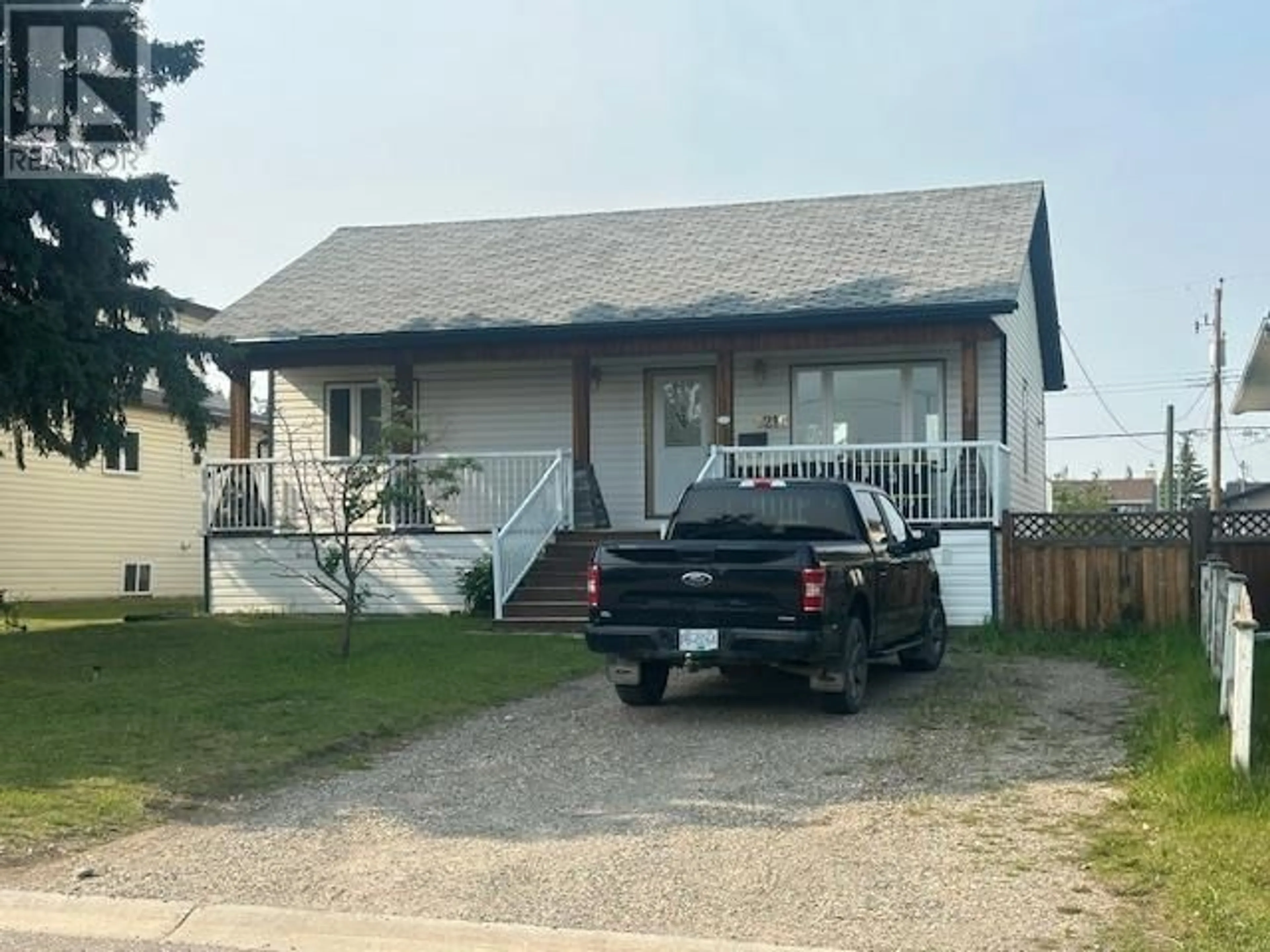 Home with vinyl exterior material, unknown for 8216 94 AVENUE, Fort St. John British Columbia V1J1E8