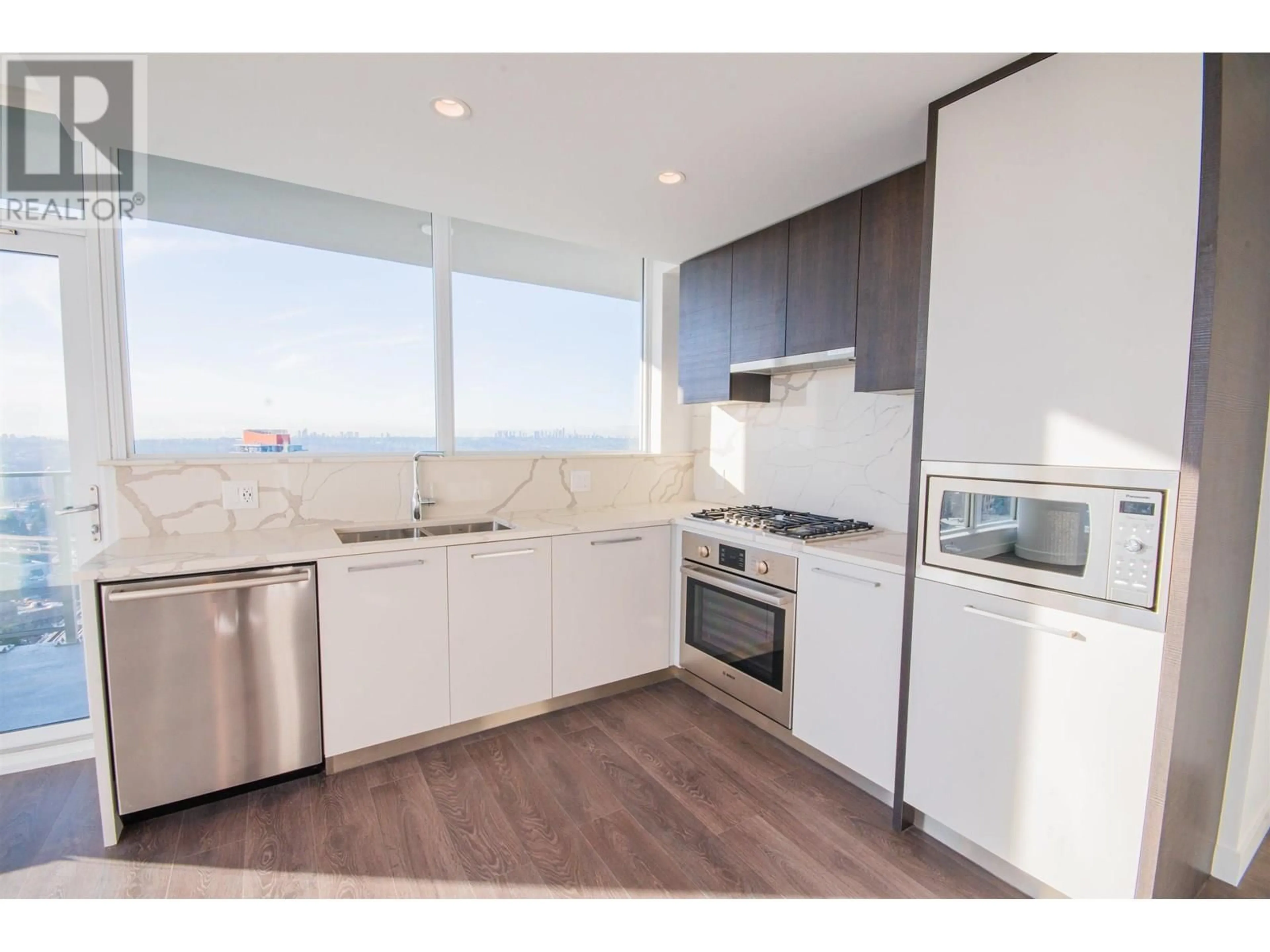 Standard kitchen, wood/laminate floor for 2309 - 567 CLARKE ROAD, Coquitlam British Columbia V3J0K7