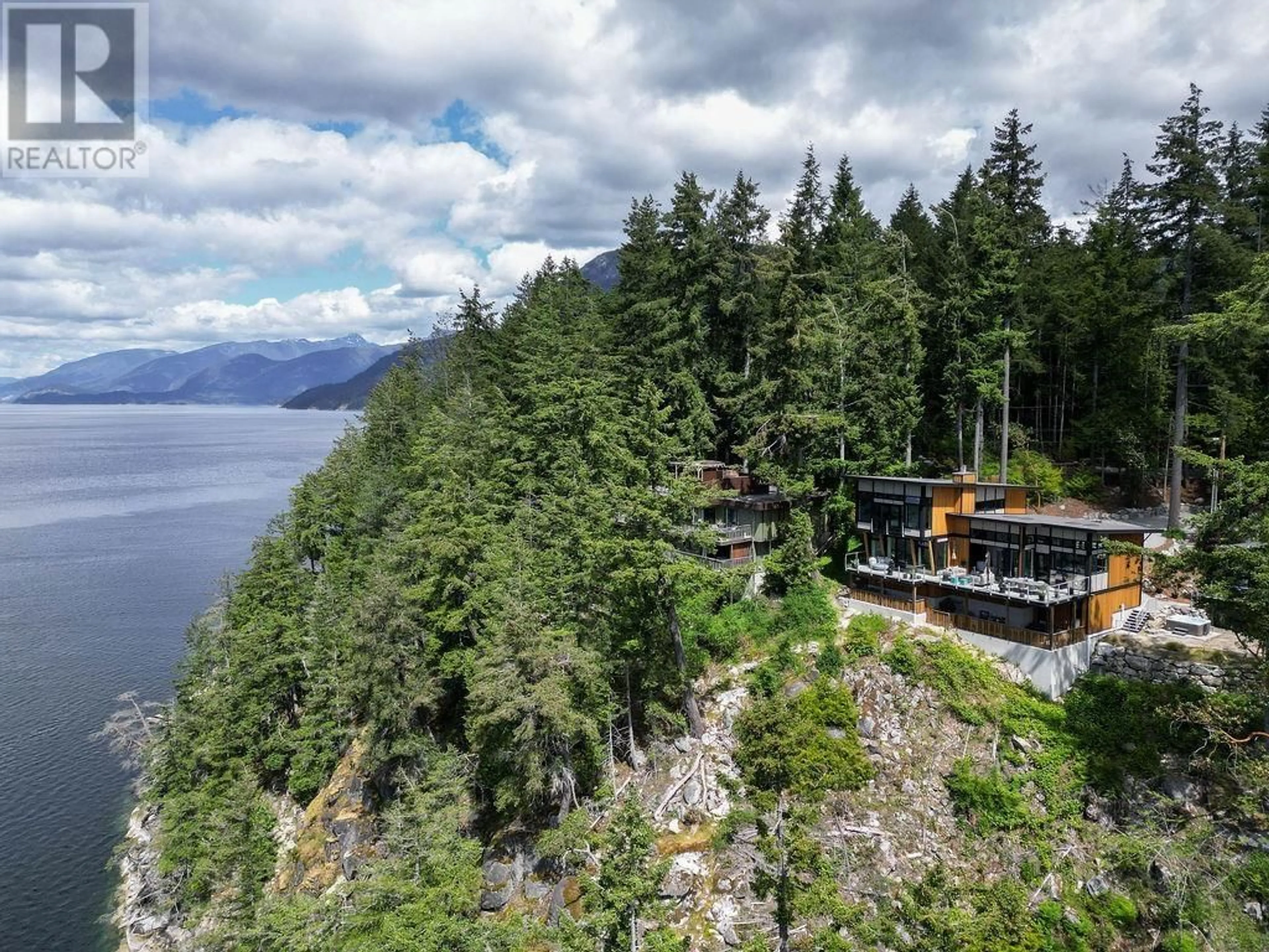 A pic from outside/outdoor area/front of a property/back of a property/a pic from drone, water/lake/river/ocean view for 6101 - 6099 CORACLE DRIVE, Sechelt British Columbia V7Z0C9