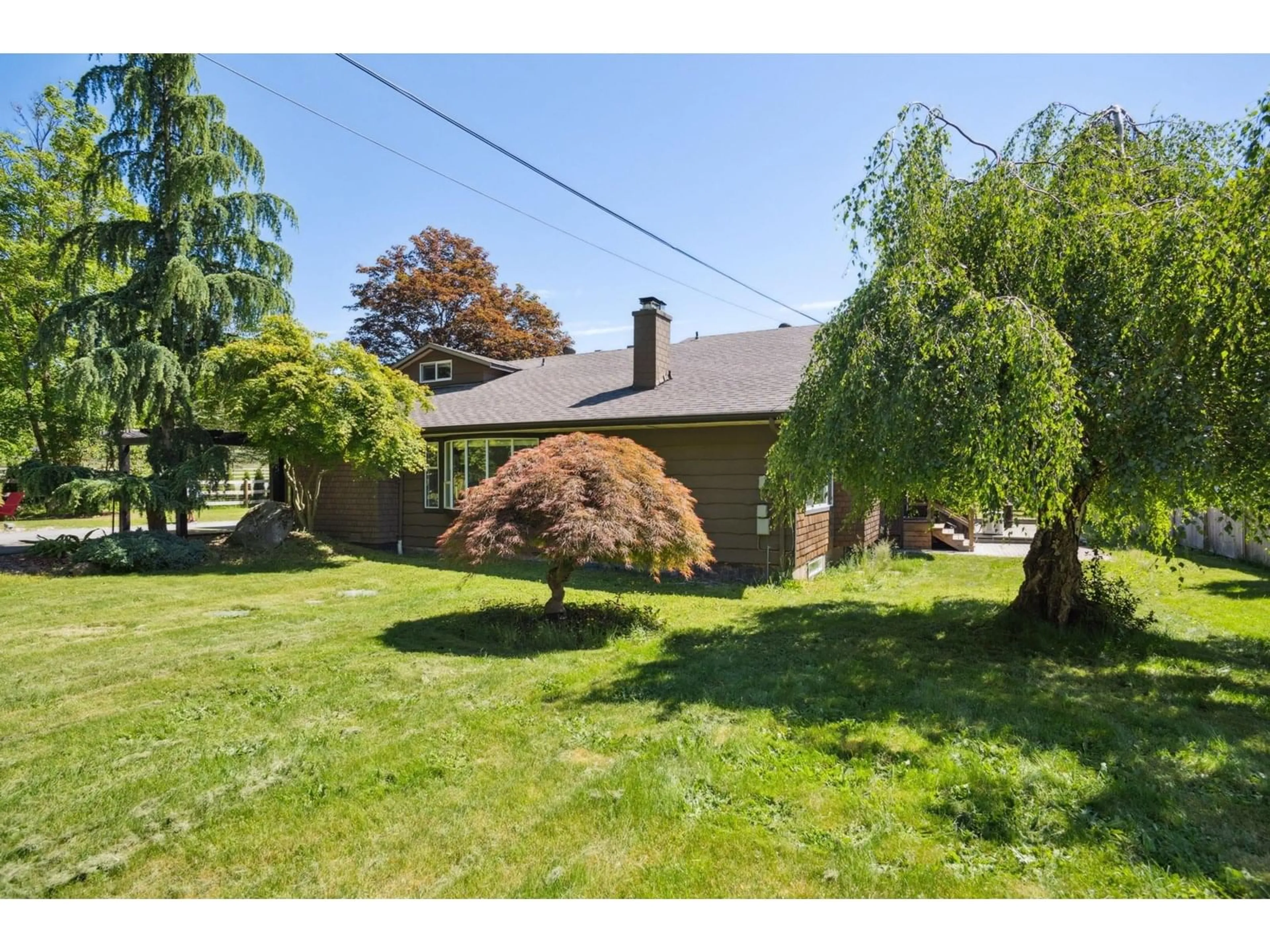A pic from outside/outdoor area/front of a property/back of a property/a pic from drone, street for 1144 216, Langley British Columbia V2Z1R3