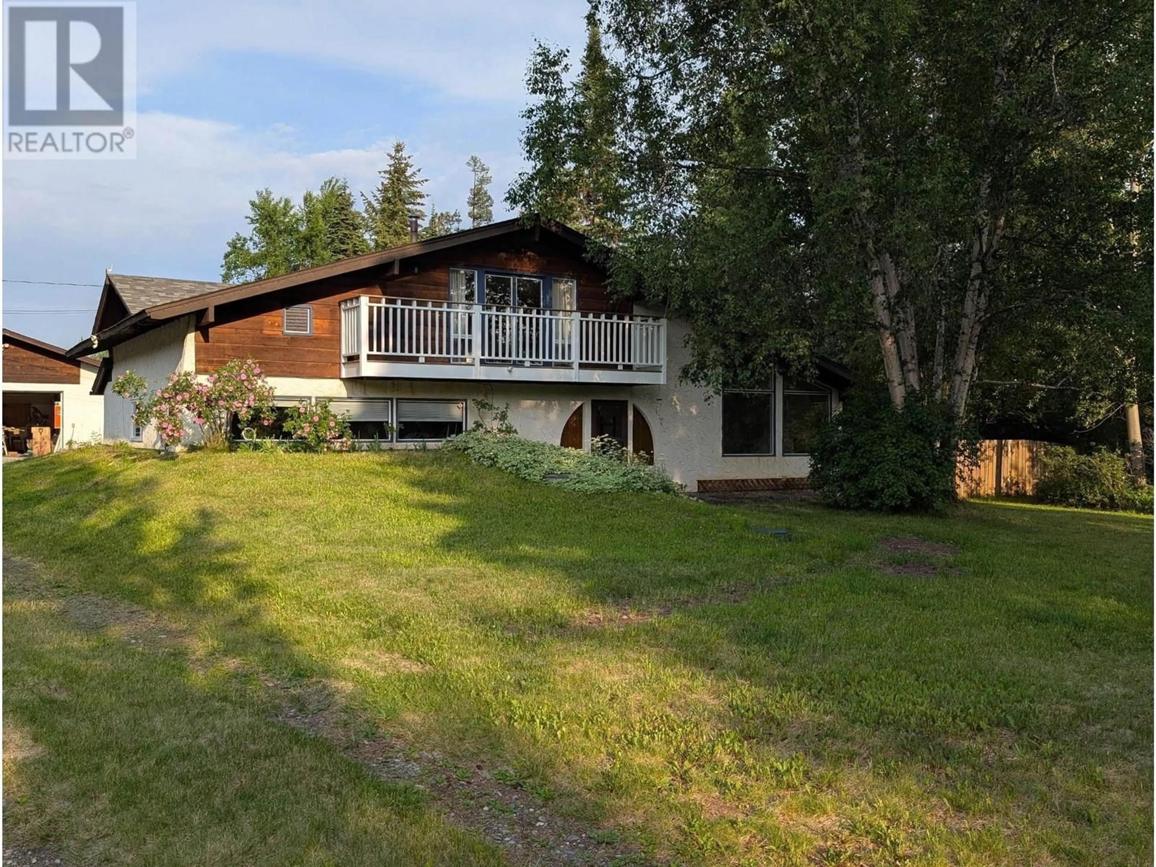 A pic from outside/outdoor area/front of a property/back of a property/a pic from drone, mountain view for 3840 RIVERVIEW ROAD, Prince George British Columbia V2K4Y7