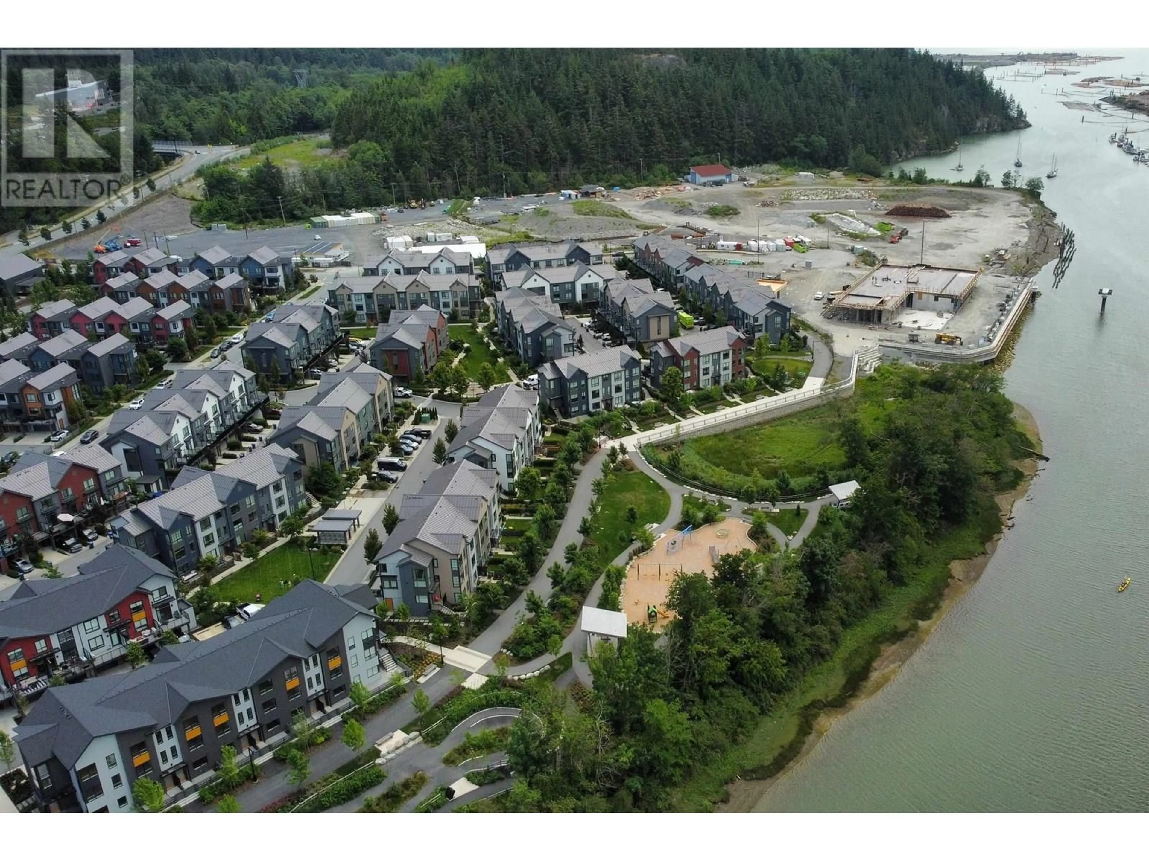 A pic from outside/outdoor area/front of a property/back of a property/a pic from drone, water/lake/river/ocean view for 38043 HELM WAY, Squamish British Columbia V8B1E6