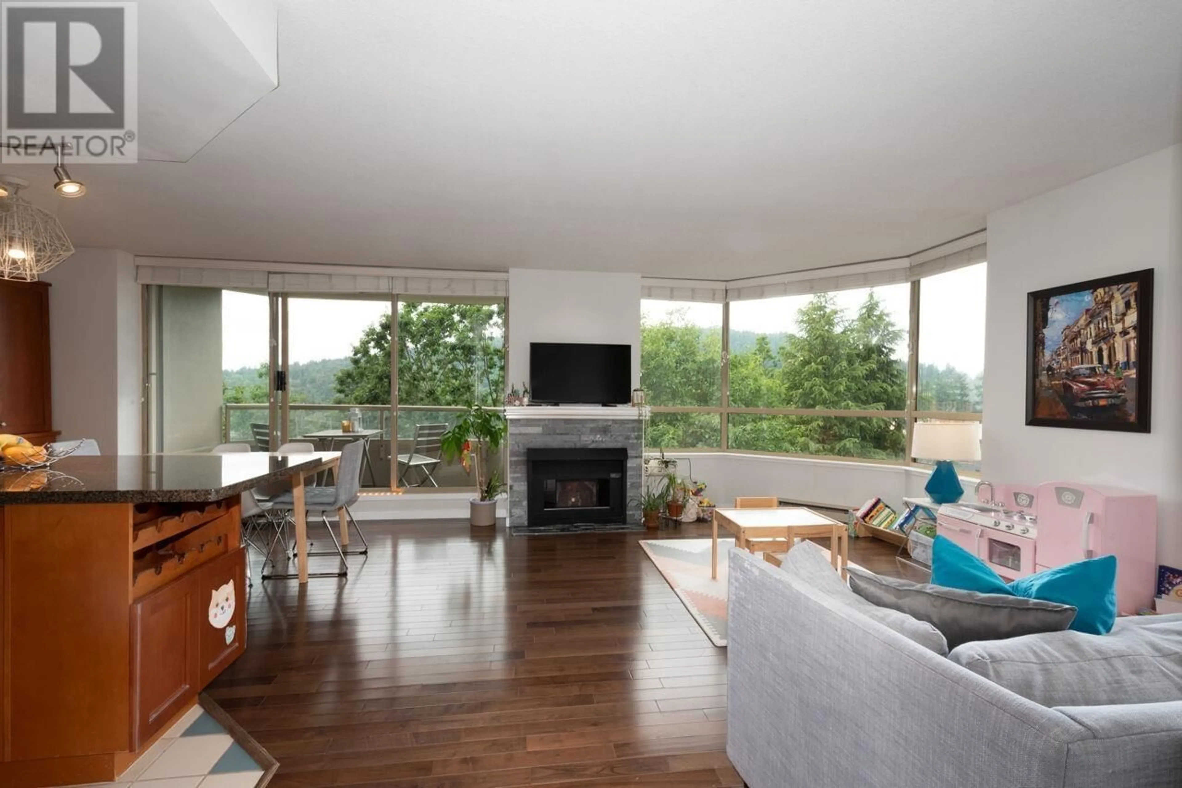 Living room with furniture, wood/laminate floor for 603 - 738 FARROW STREET, Coquitlam British Columbia V3J7V4