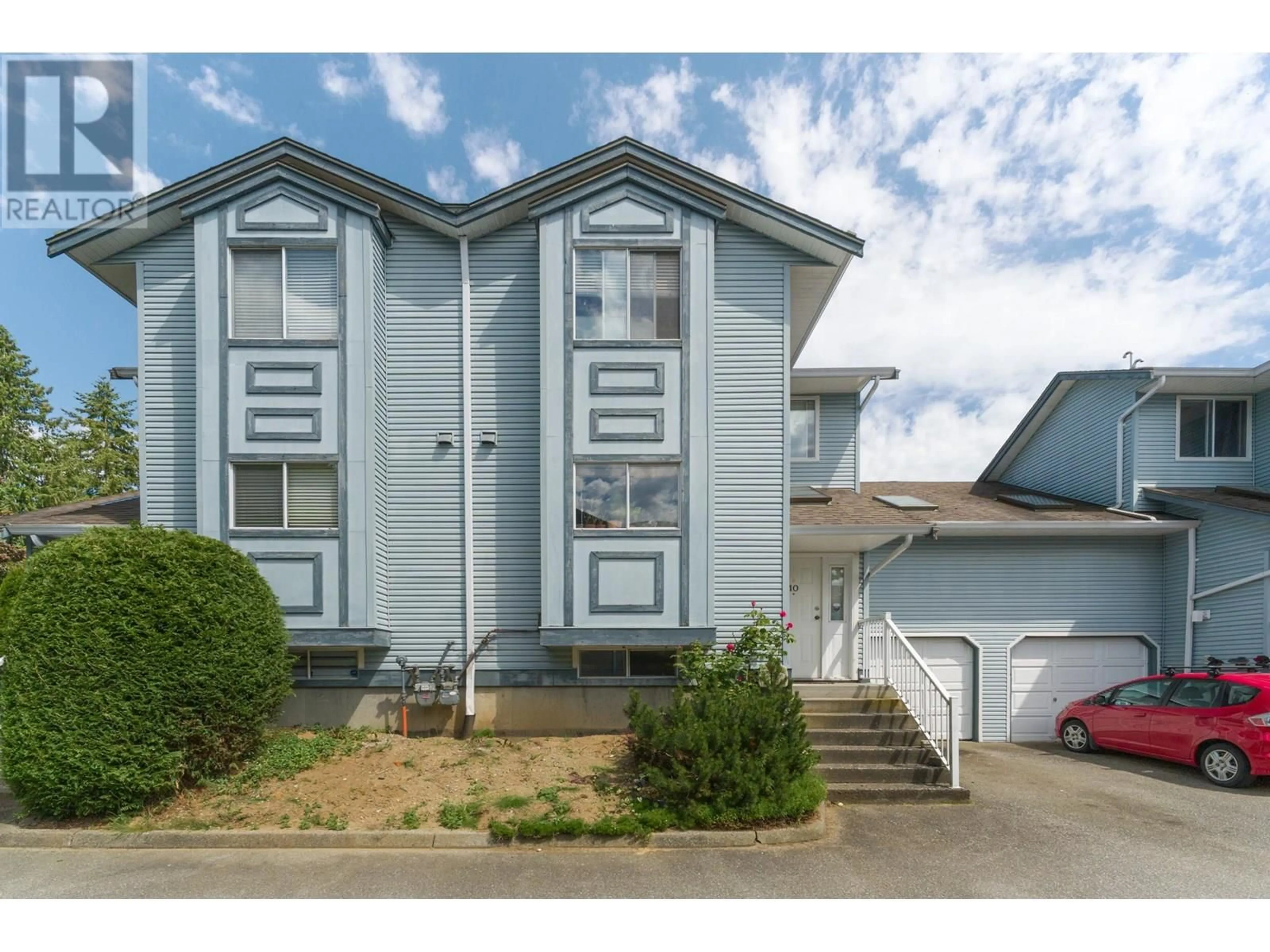 Home with vinyl exterior material, street for 10 - 19252 119TH AVENUE, Pitt Meadows British Columbia V3Y2K4