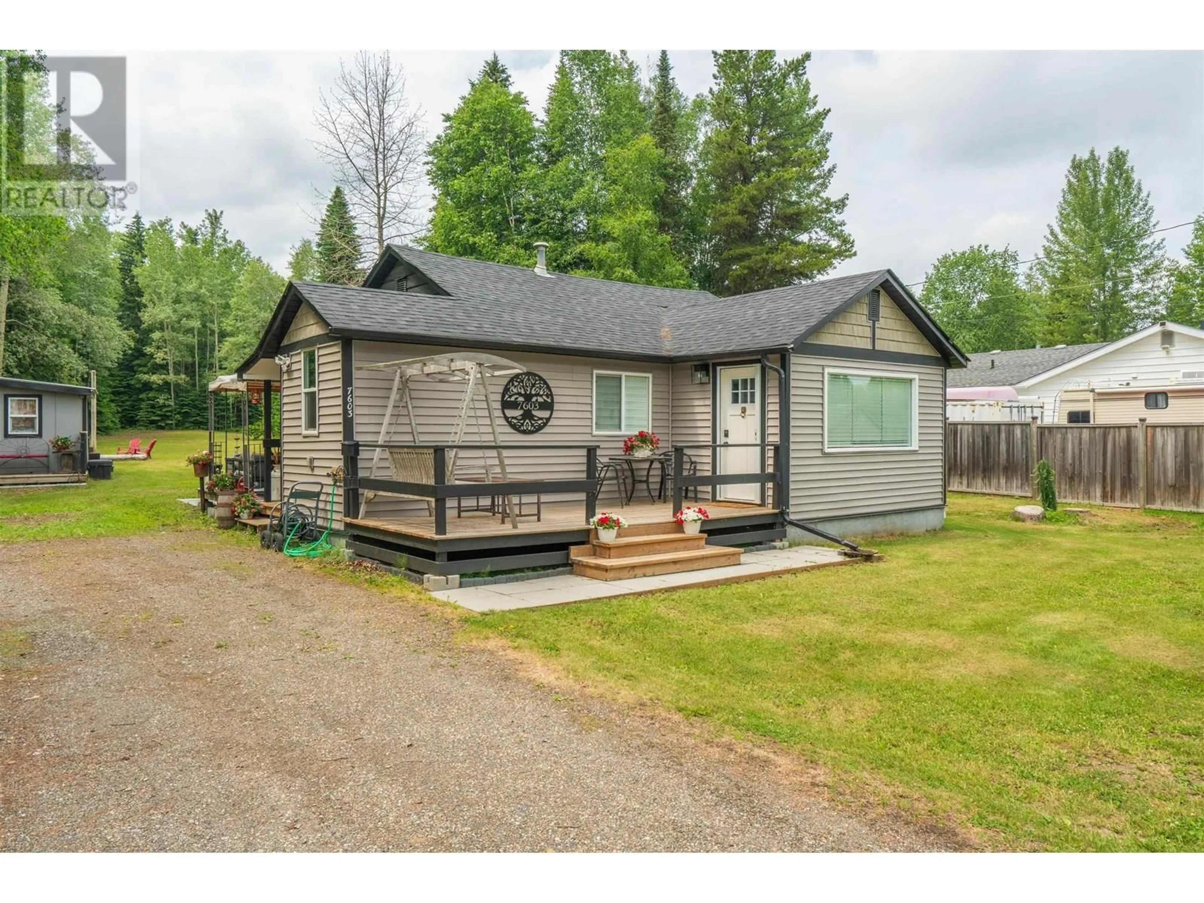 Home with vinyl exterior material, street for 7603 KELLY ROAD, Prince George British Columbia V2K2H4