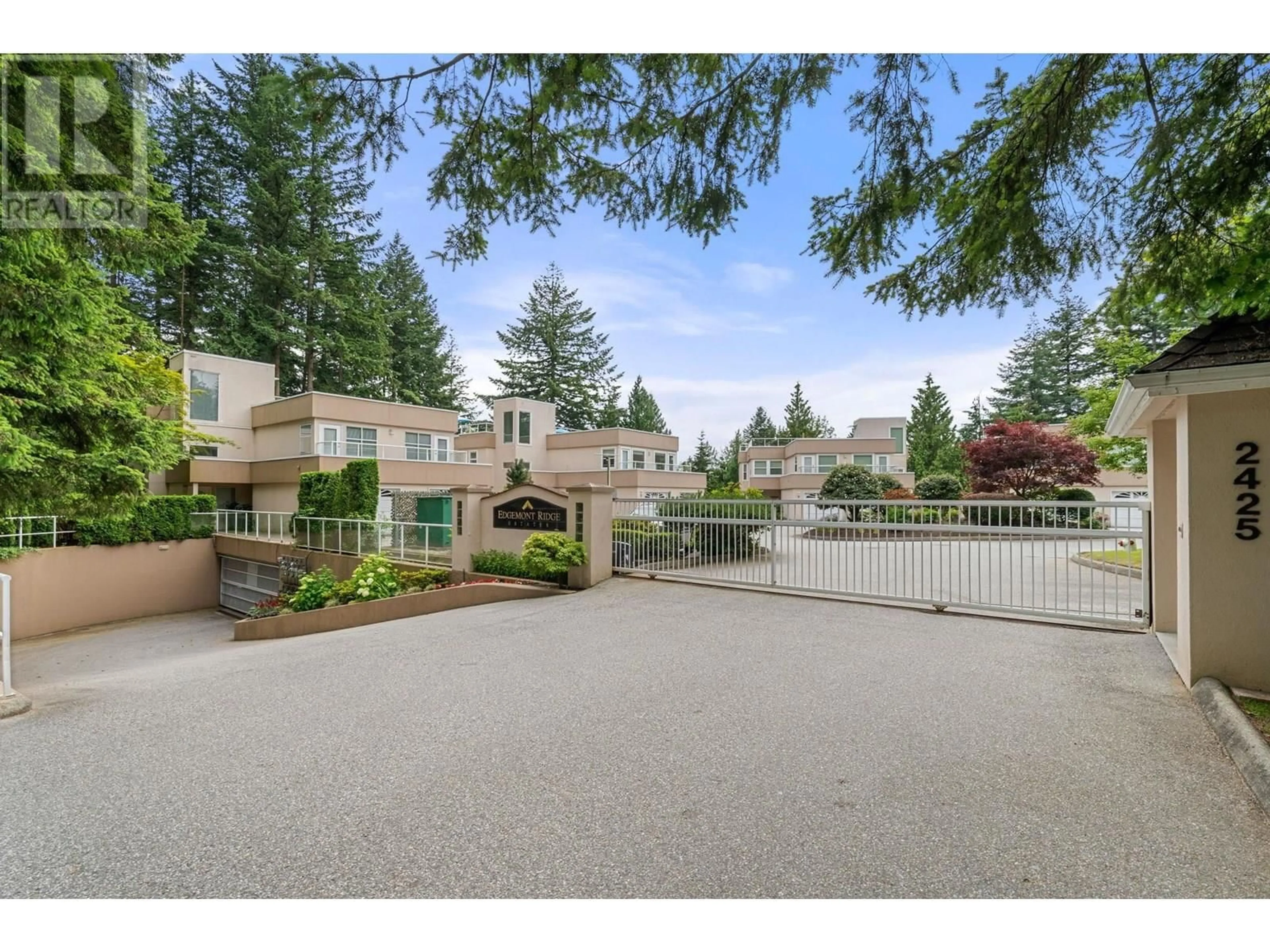 A pic from outside/outdoor area/front of a property/back of a property/a pic from drone, unknown for 13 - 2425 EDGEMONT BOULEVARD, North Vancouver British Columbia V7P2L2