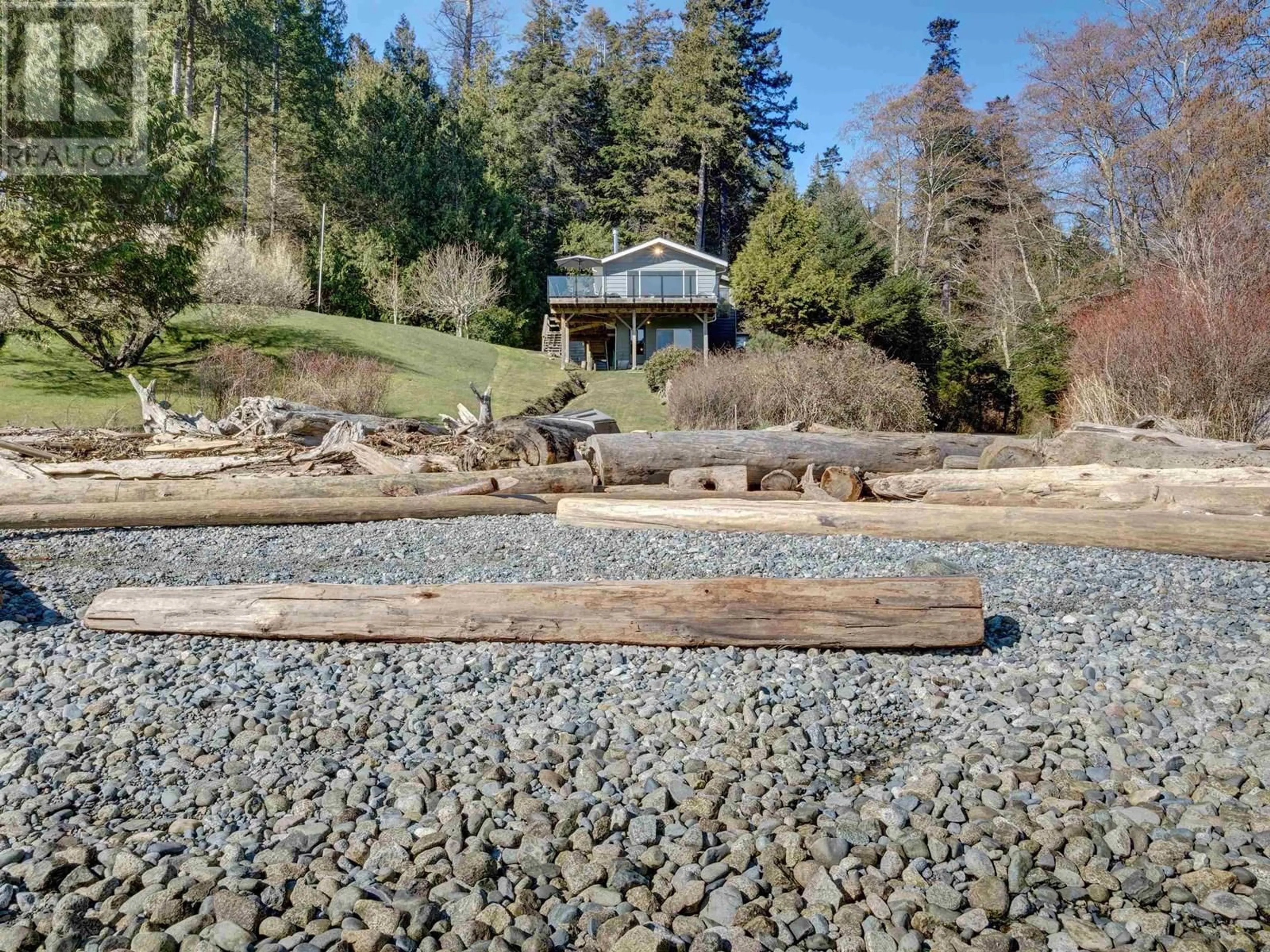 A pic from outside/outdoor area/front of a property/back of a property/a pic from drone, water/lake/river/ocean view for 7653 REDROOFFS ROAD, Halfmoon Bay British Columbia V7Z1C4