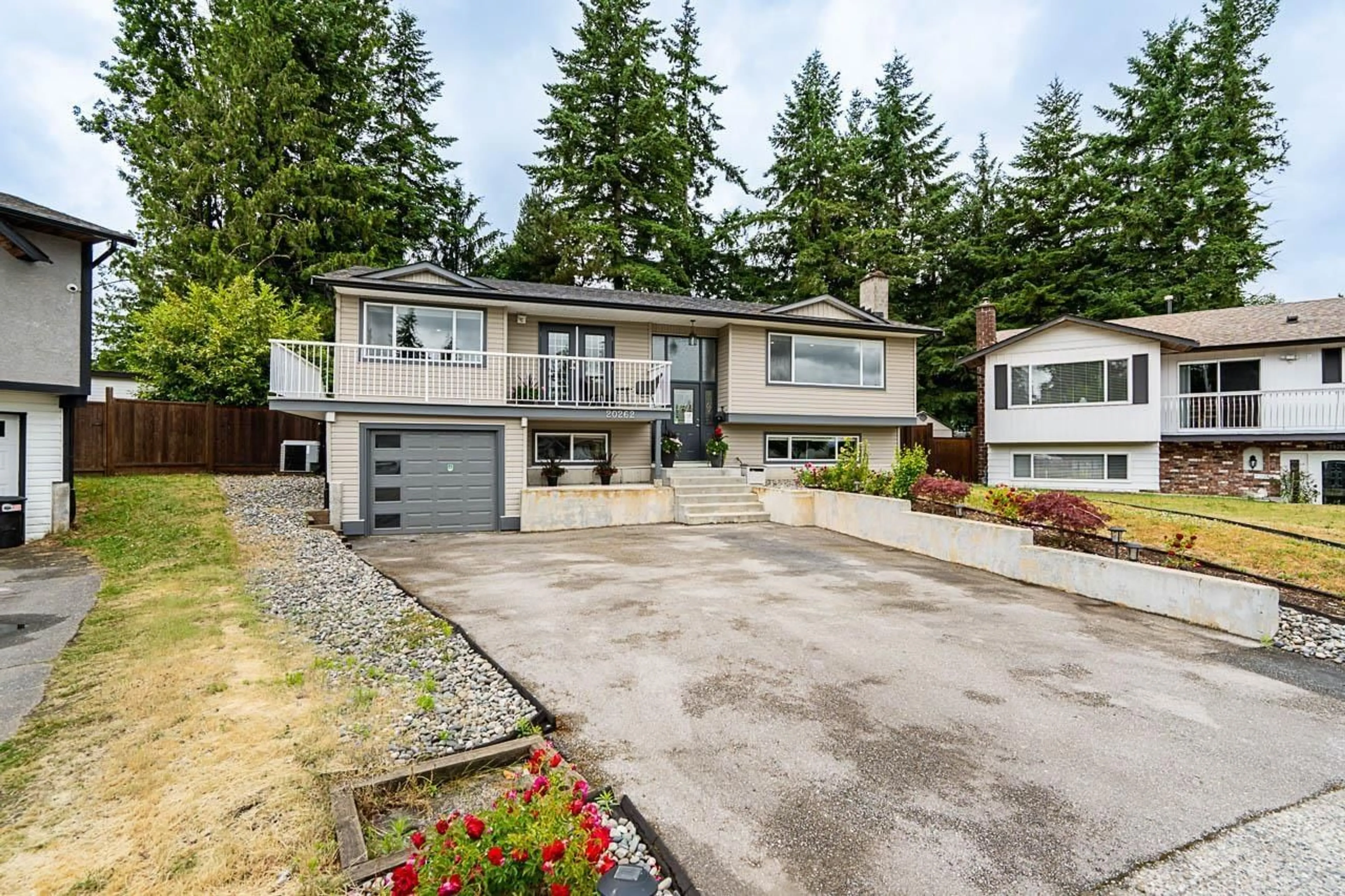 Home with vinyl exterior material, street for 20262 46A, Langley British Columbia V3A5K4