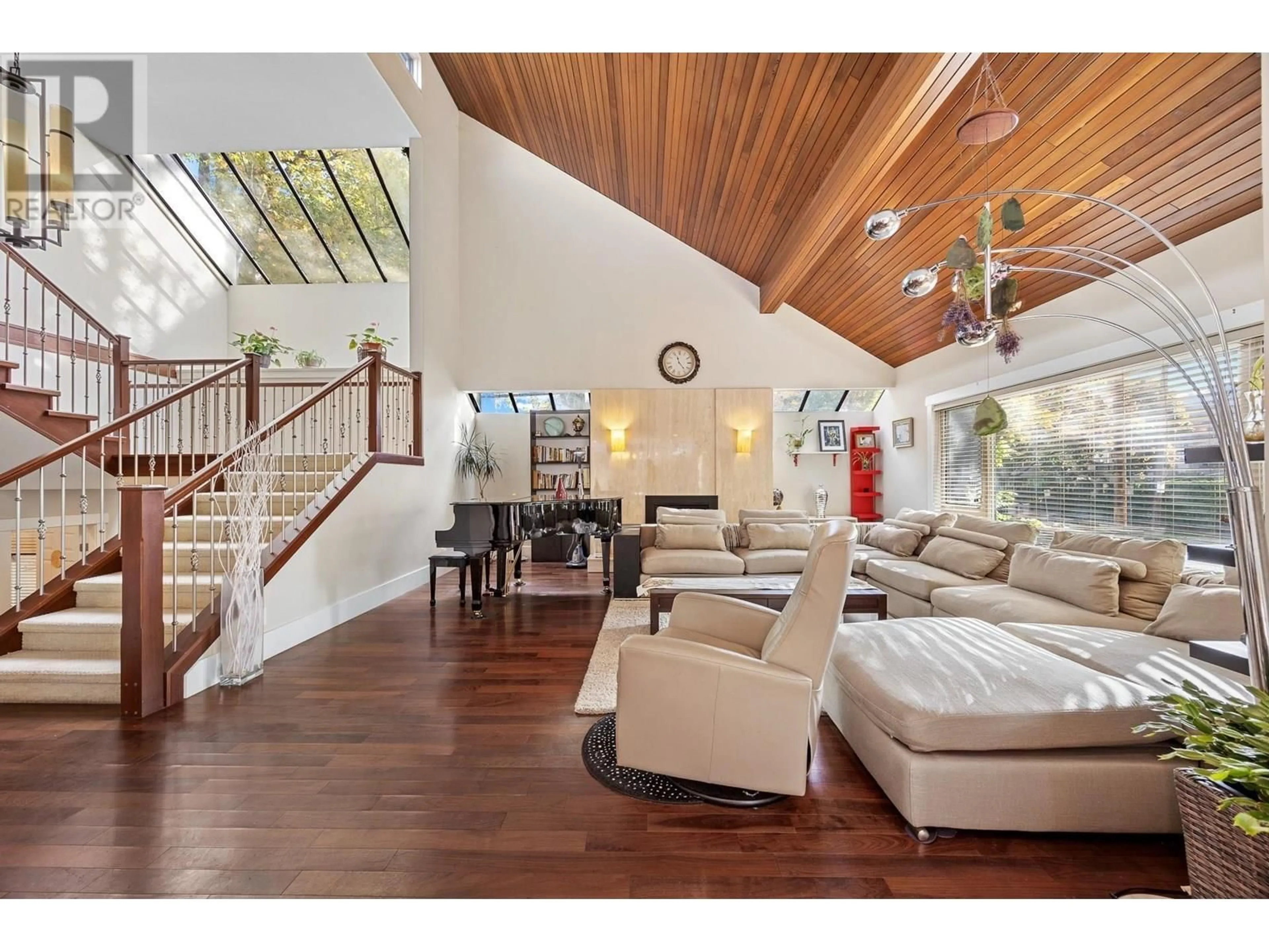 Living room with furniture, wood/laminate floor for 5483 CARNARVON STREET, Vancouver British Columbia V6N4G1