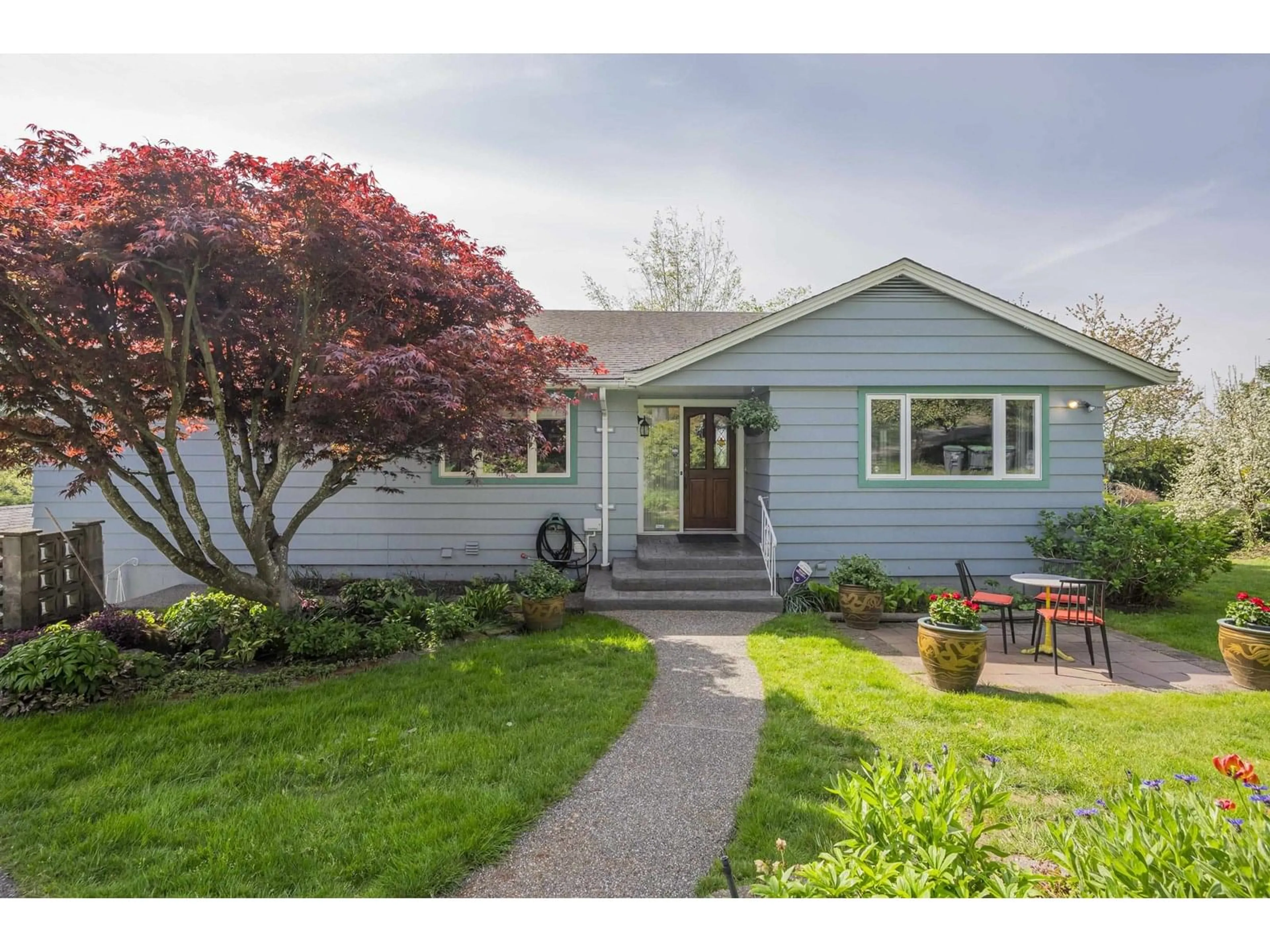Home with vinyl exterior material, street for 13128 COUTHARD, Surrey British Columbia V3X3E6