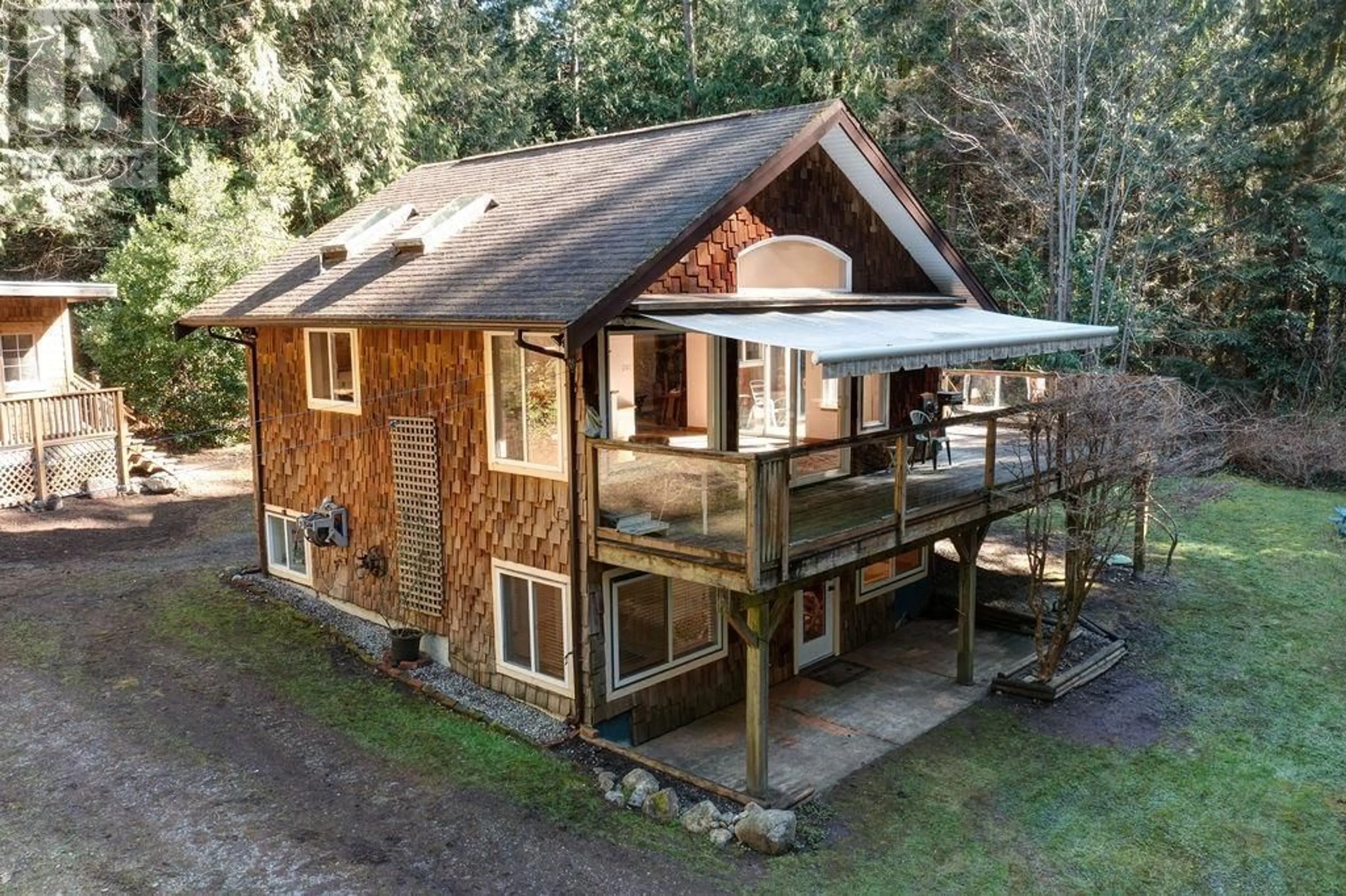 A pic from outside/outdoor area/front of a property/back of a property/a pic from drone, building for 1028 BLACKBURN ROAD, Roberts Creek British Columbia V0N2W4