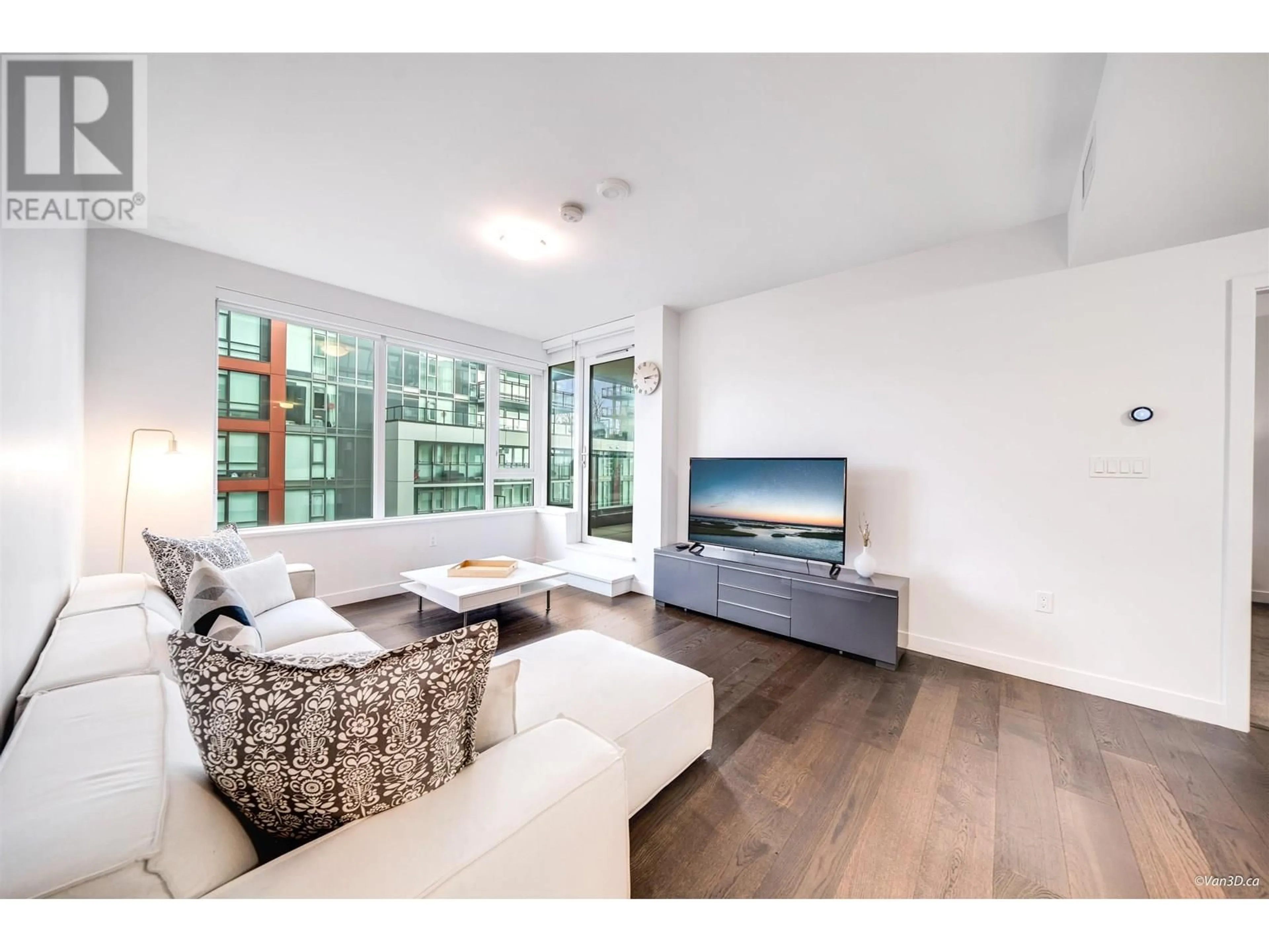Living room with furniture, wood/laminate floor for 912 - 8160 MCMYN WAY, Richmond British Columbia V6X0V2