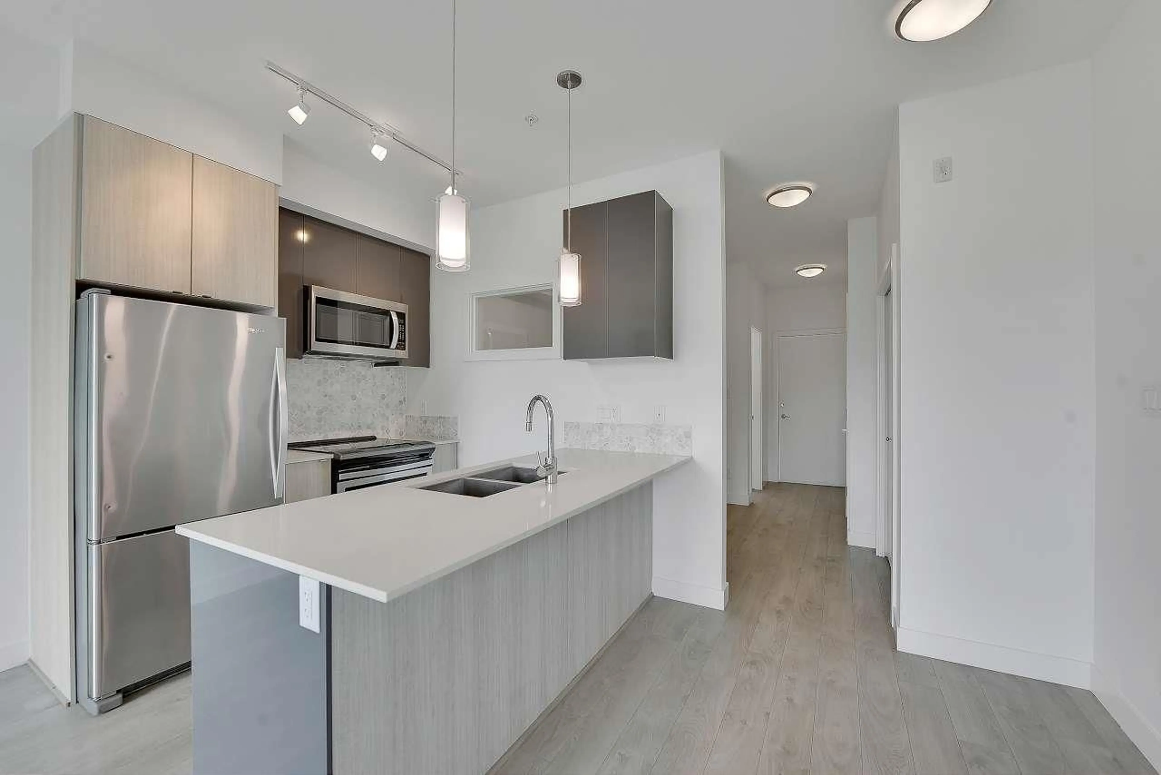 Open concept kitchen, unknown for 303 - 6438 195A, Surrey British Columbia V4N6R5