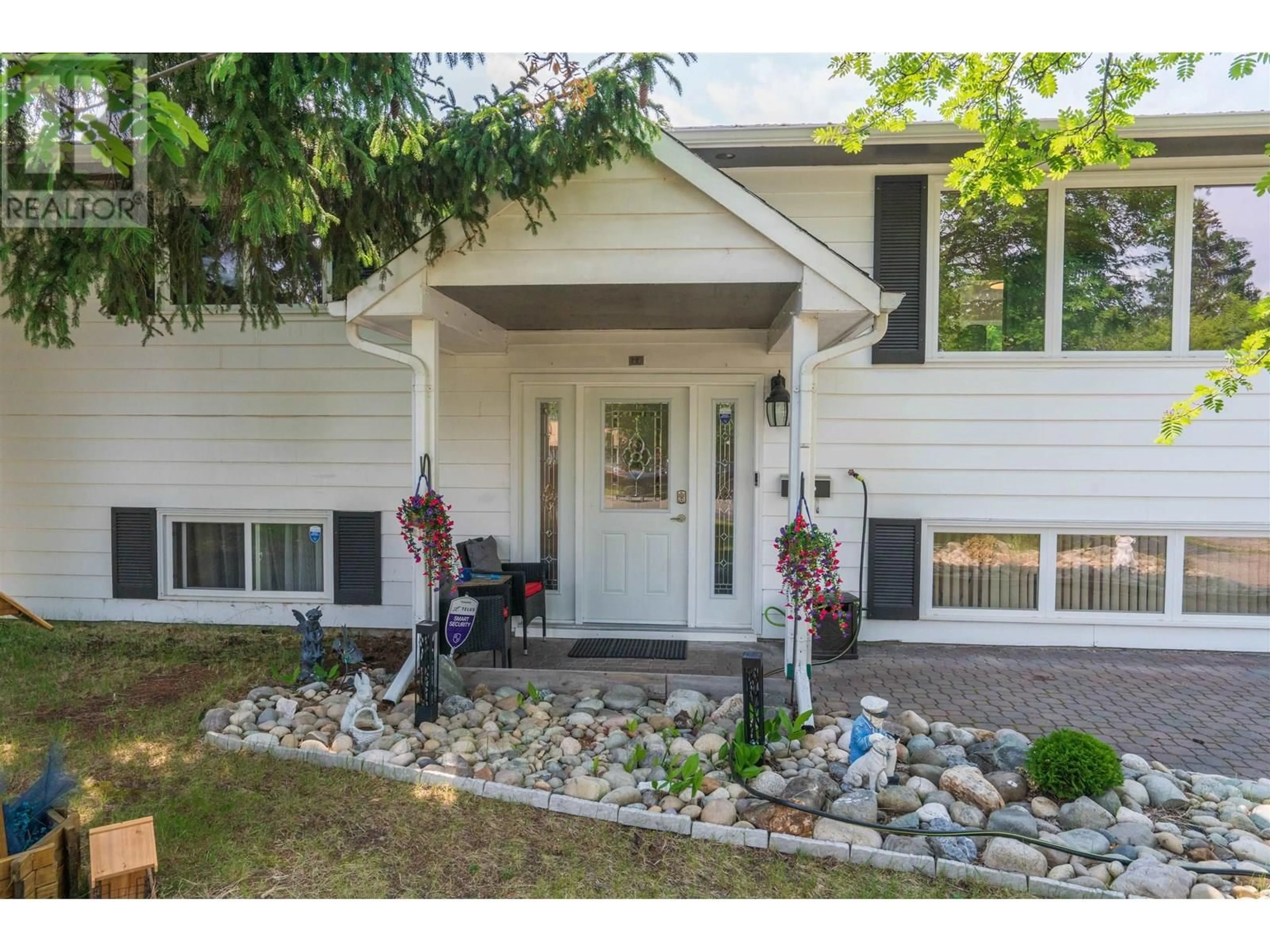 Home with vinyl exterior material, street for 223 TRADER CRESCENT, Prince George British Columbia V2M4M8
