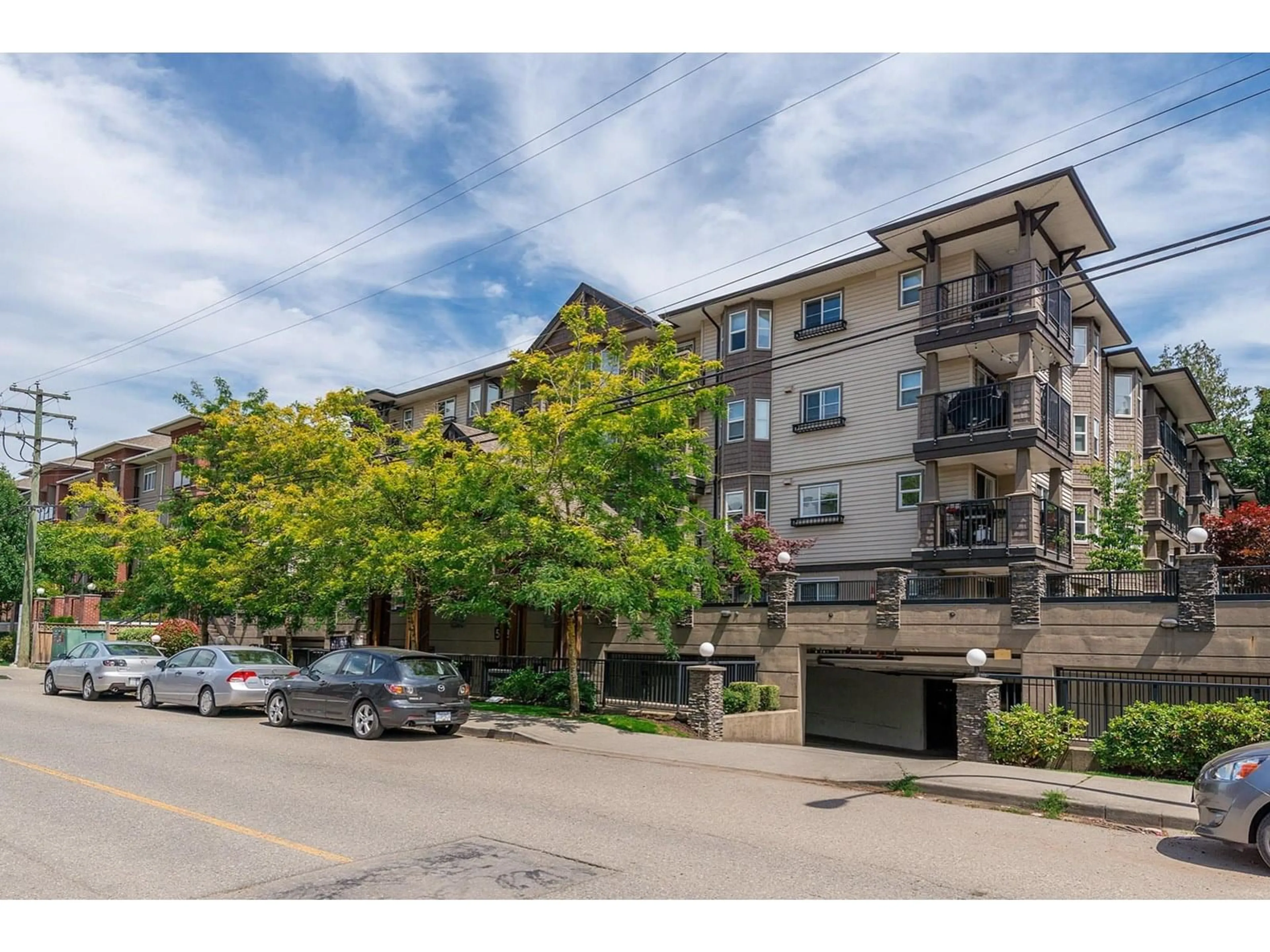 A pic from outside/outdoor area/front of a property/back of a property/a pic from drone, unknown for 407 - 5488 198, Langley British Columbia V3A1G2