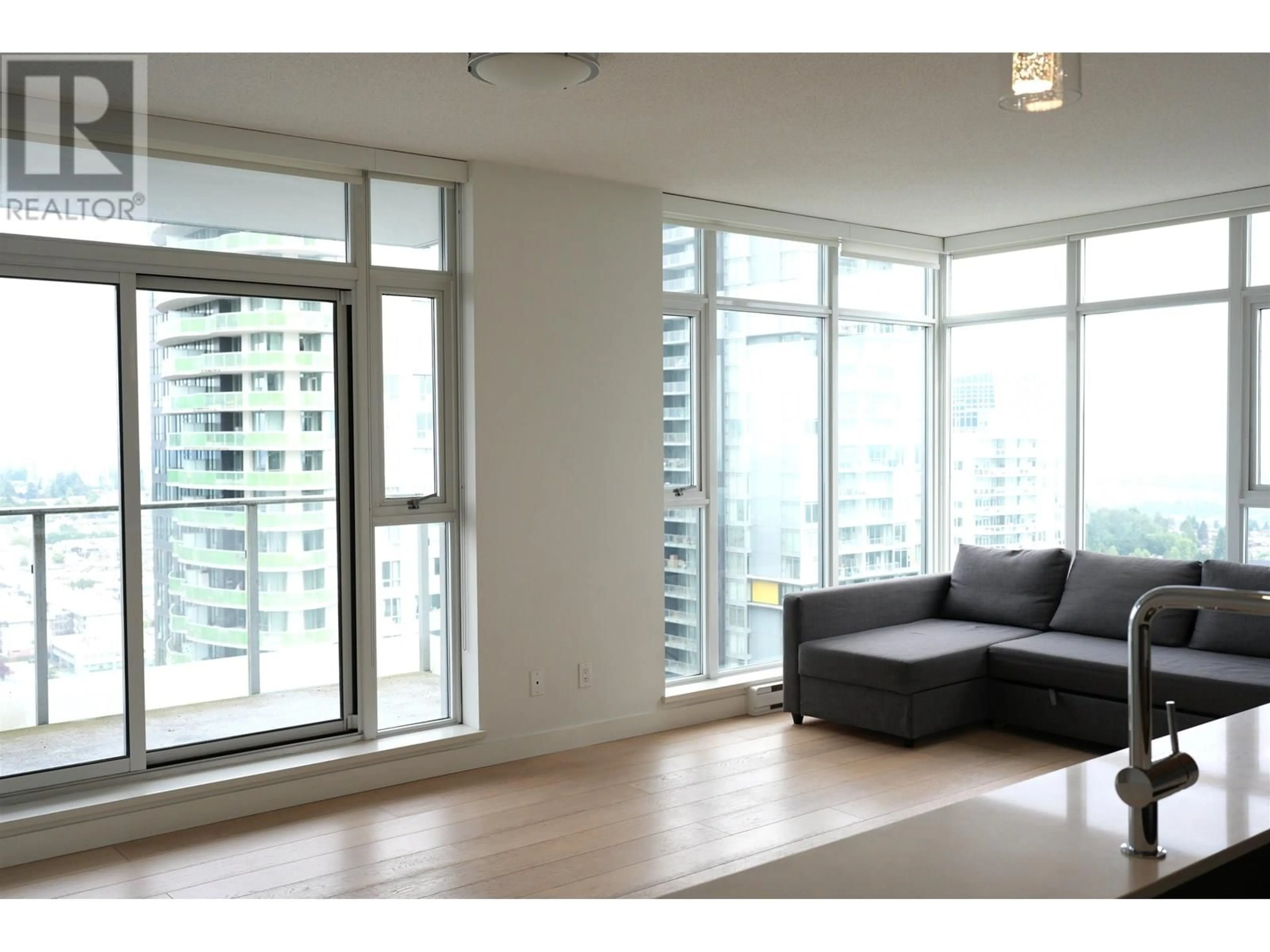 Living room with furniture, wood/laminate floor for 3102 - 6588 NELSON AVENUE, Burnaby British Columbia V5H0E8
