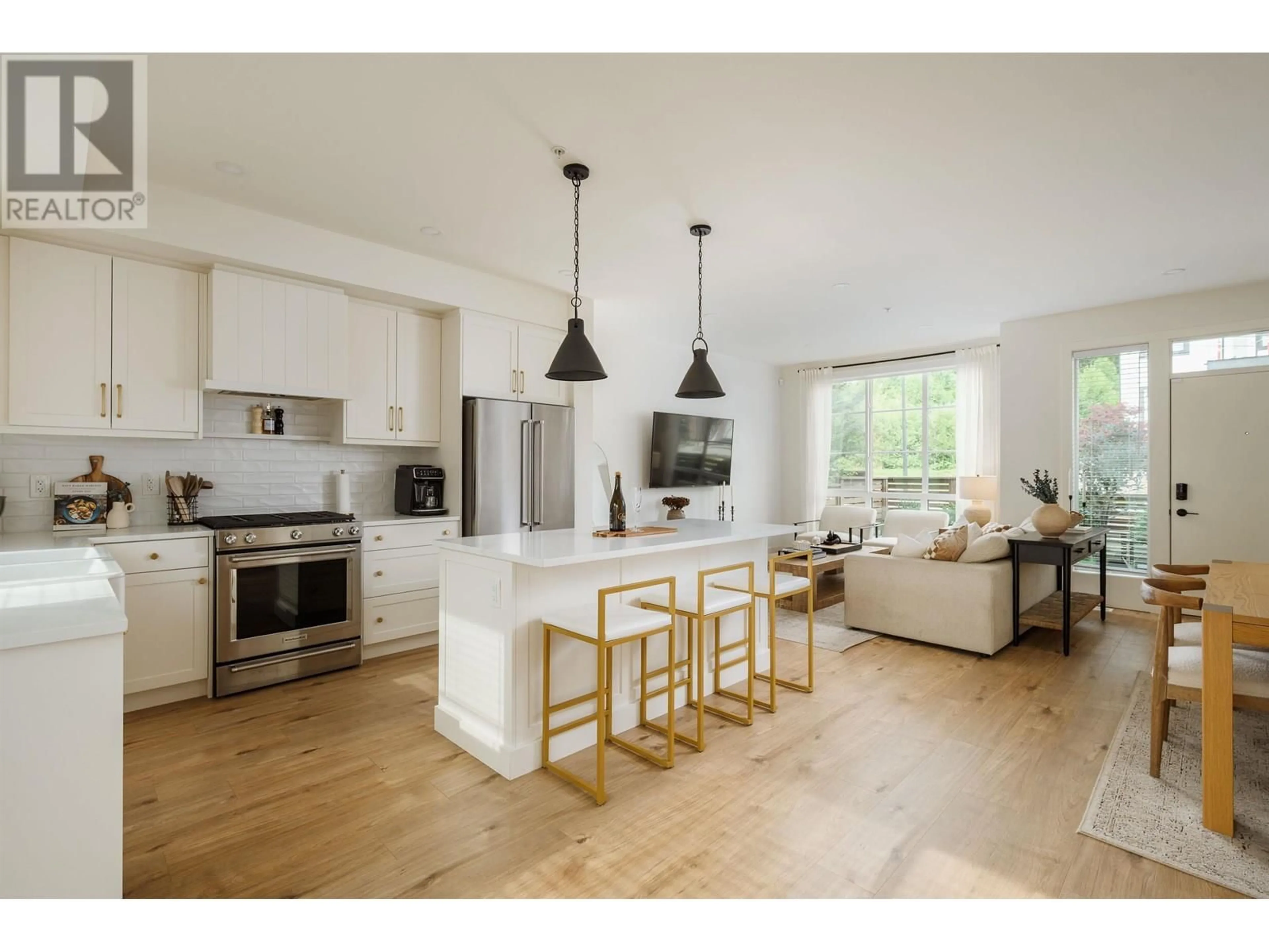 Open concept kitchen, wood/laminate floor for 10 - 23183 136 AVENUE, Maple Ridge British Columbia V4R0H9