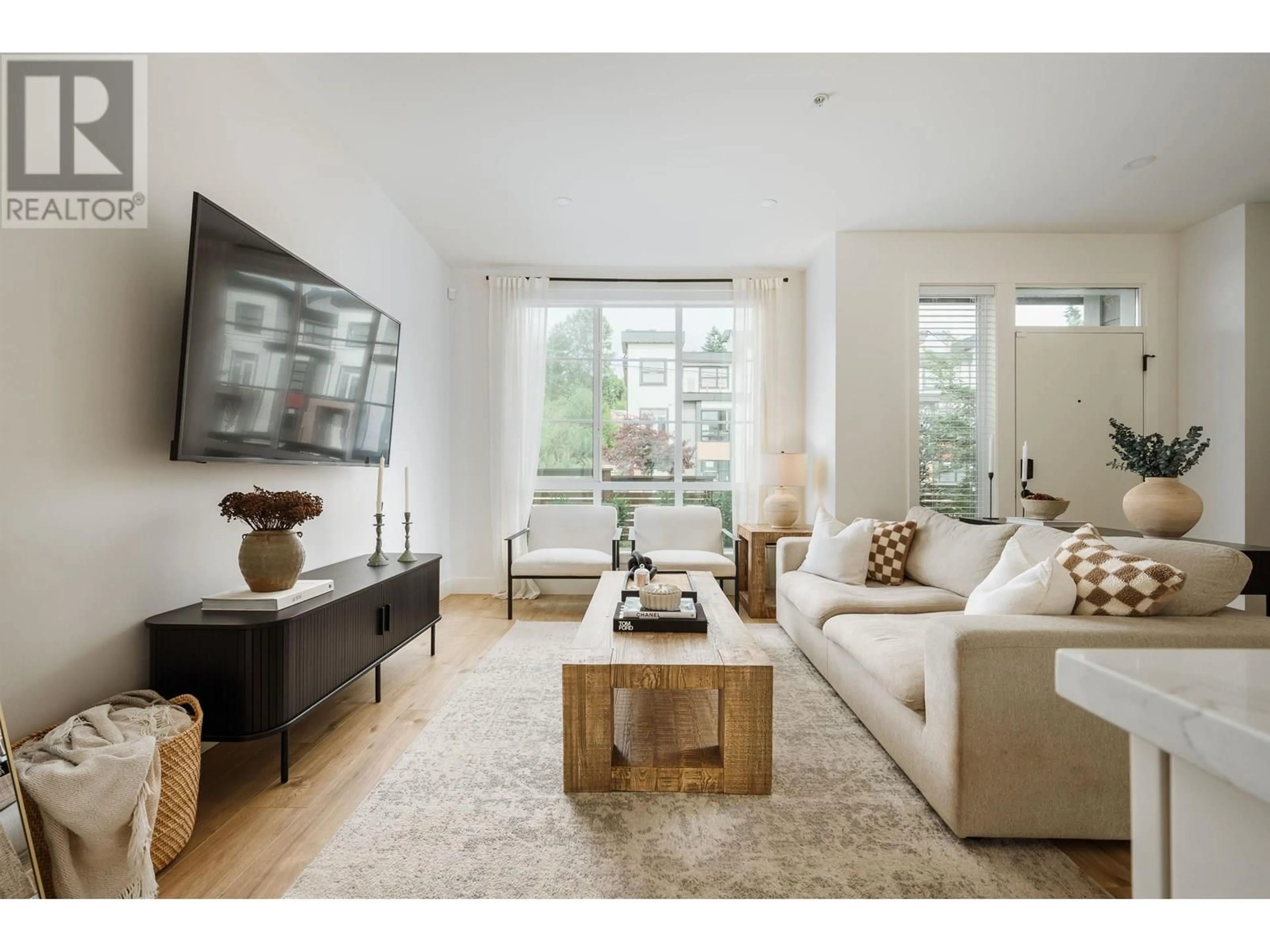 Living room with furniture, wood/laminate floor for 10 - 23183 136 AVENUE, Maple Ridge British Columbia V4R0H9