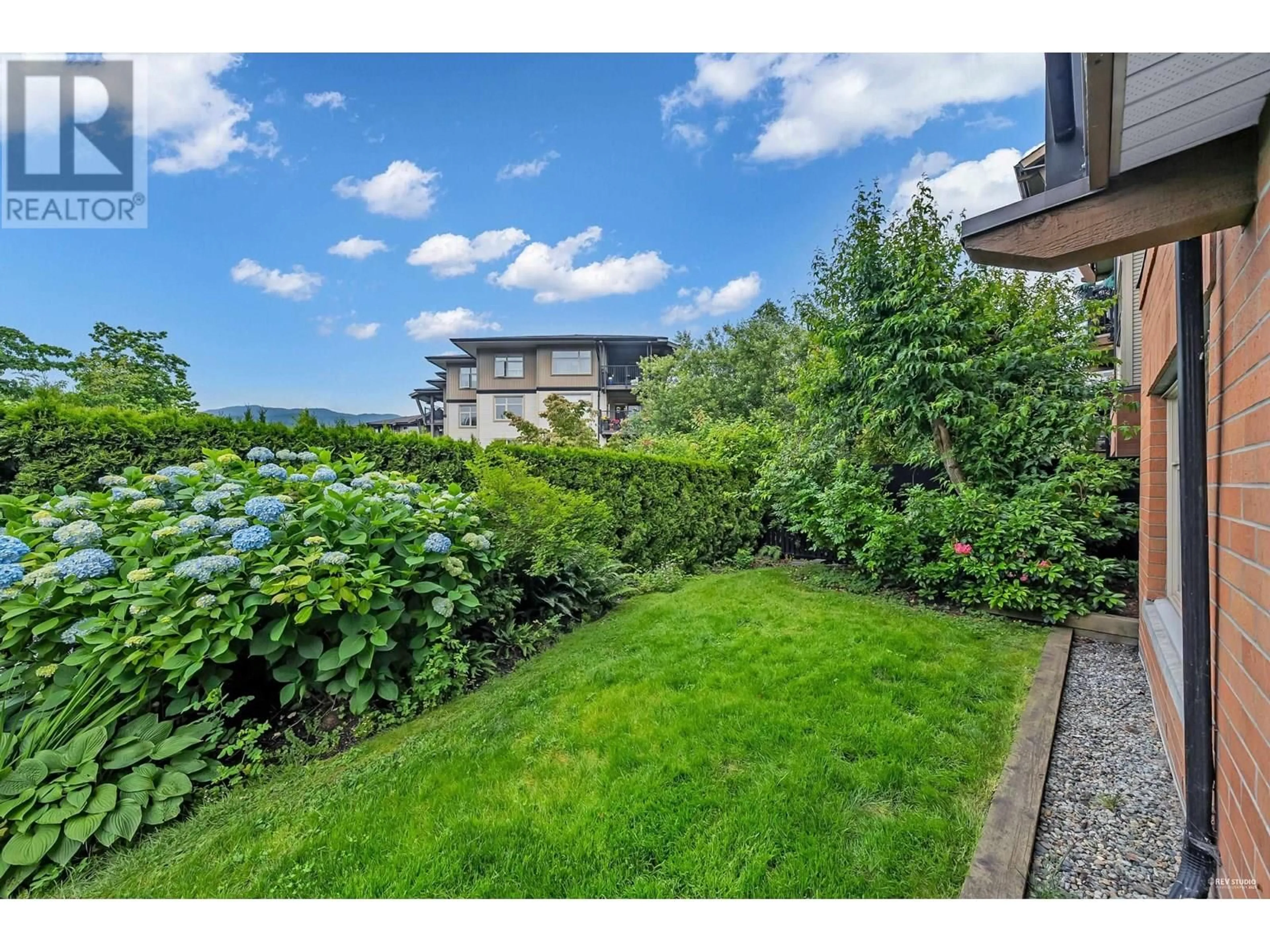 A pic from outside/outdoor area/front of a property/back of a property/a pic from drone, water/lake/river/ocean view for 105 - 500 KLAHANIE DRIVE, Port Moody British Columbia V3H5L1