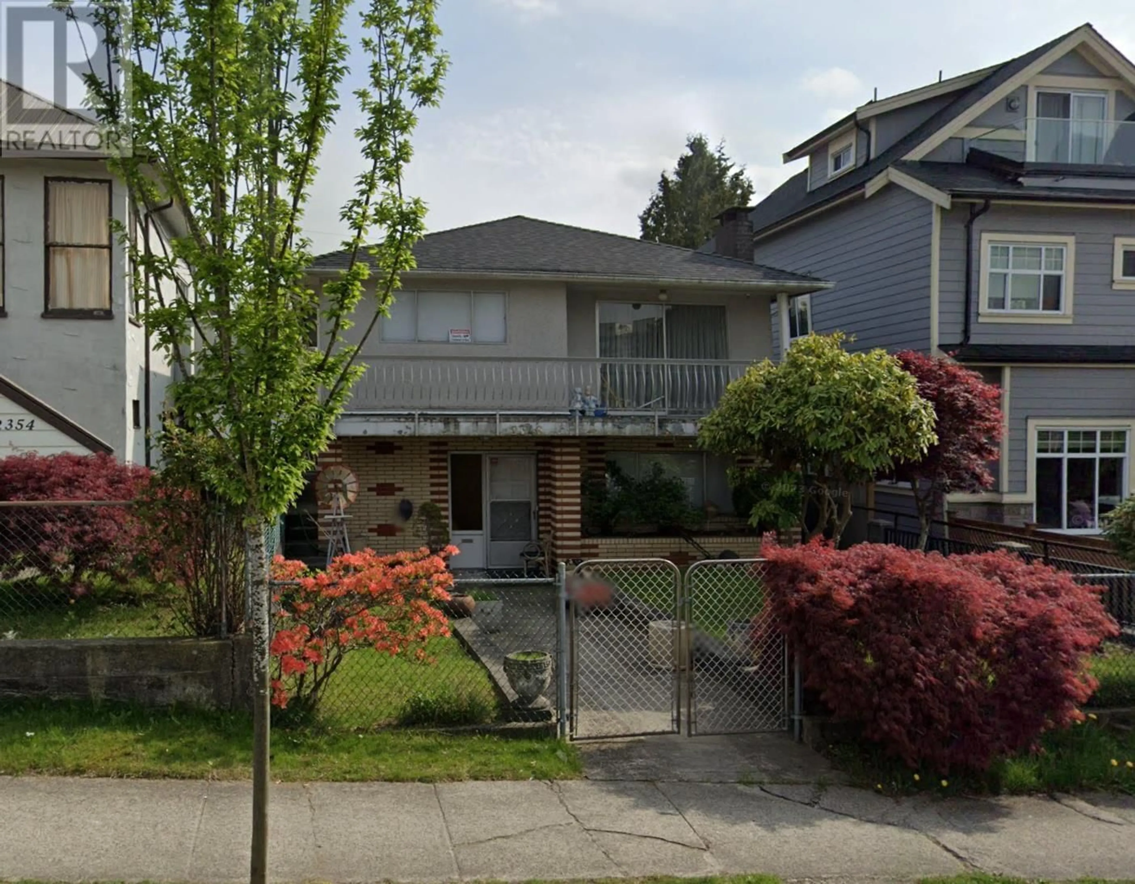 Home with vinyl exterior material, street for 2346 33RD AVENUE, Vancouver British Columbia V5R2S3