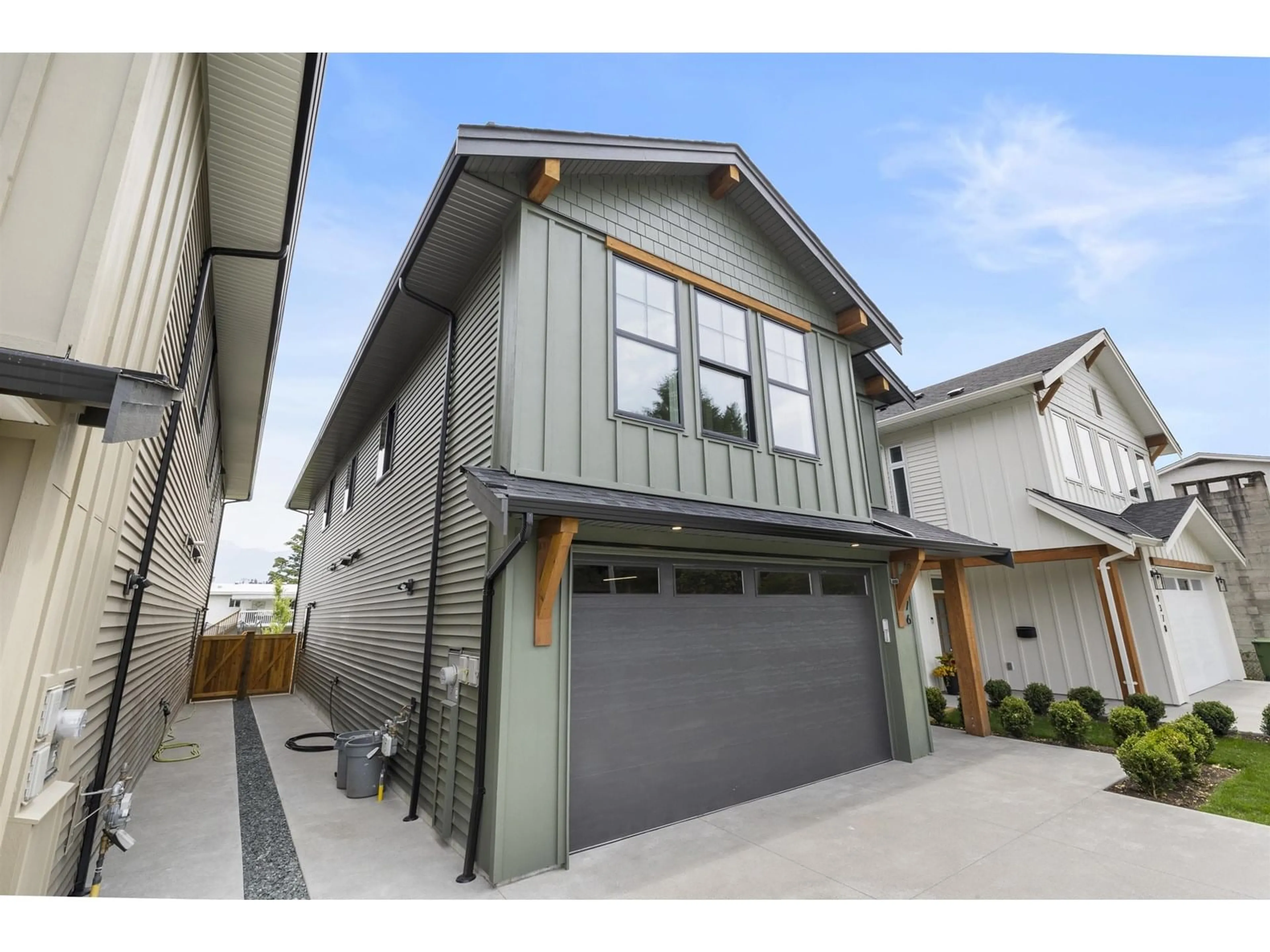 Home with vinyl exterior material, street for 9376 MCNAUGHT ROAD, Chilliwack British Columbia V2P6E8