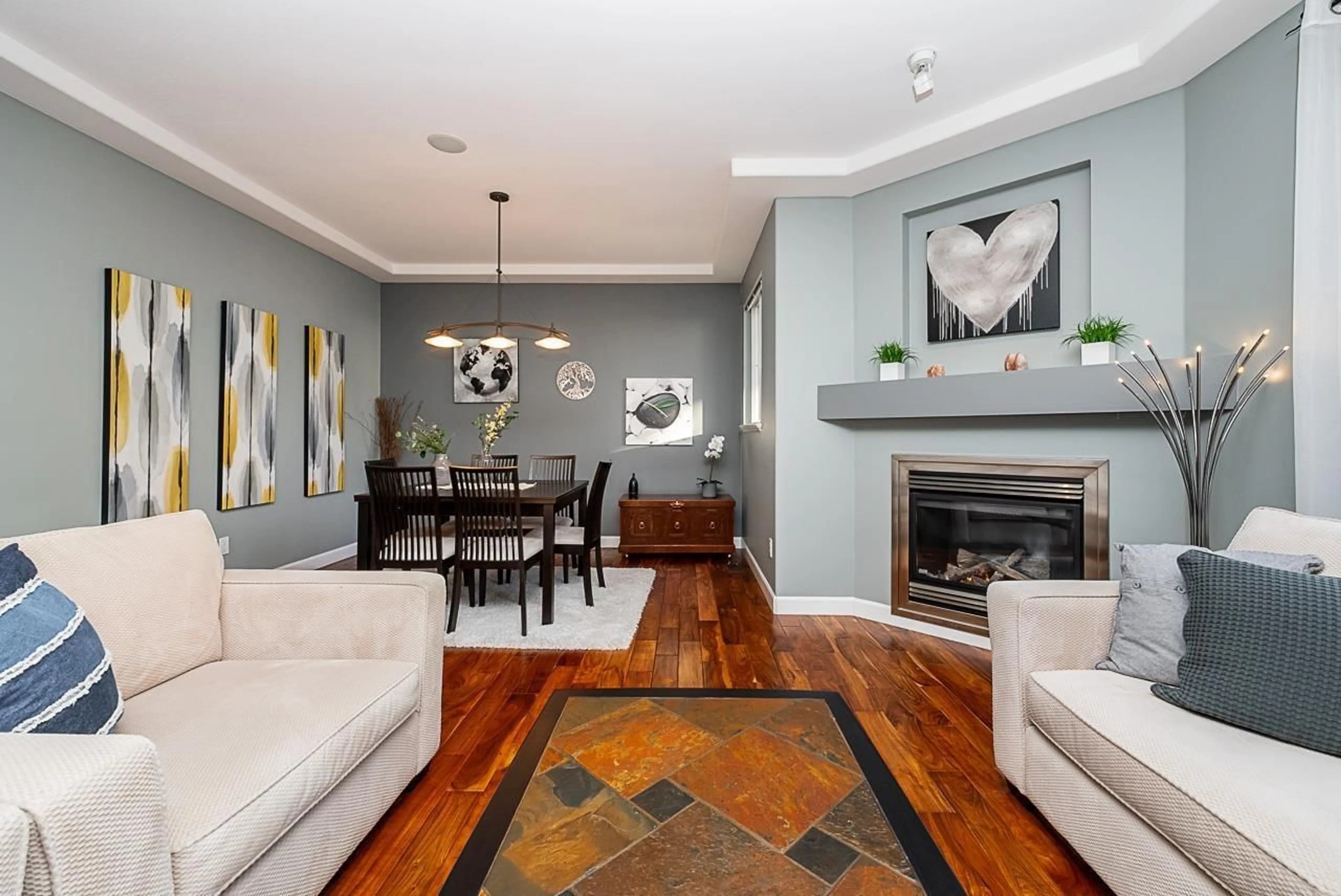 Living room with furniture, wood/laminate floor for 10 - 16760 61ST, Surrey British Columbia V3X3V3