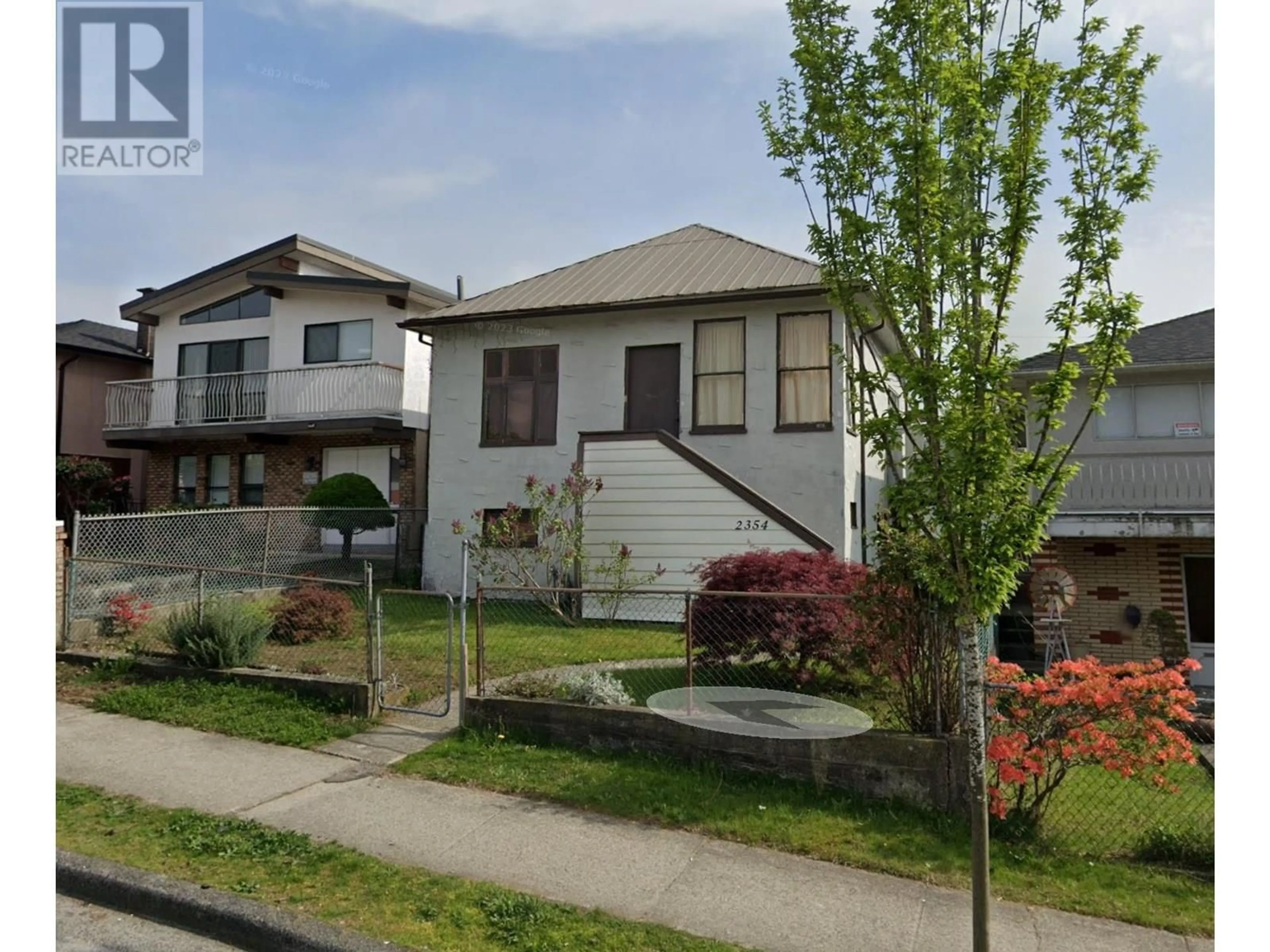 Home with vinyl exterior material, street for 2354 33RD AVENUE, Vancouver British Columbia V5R2S3