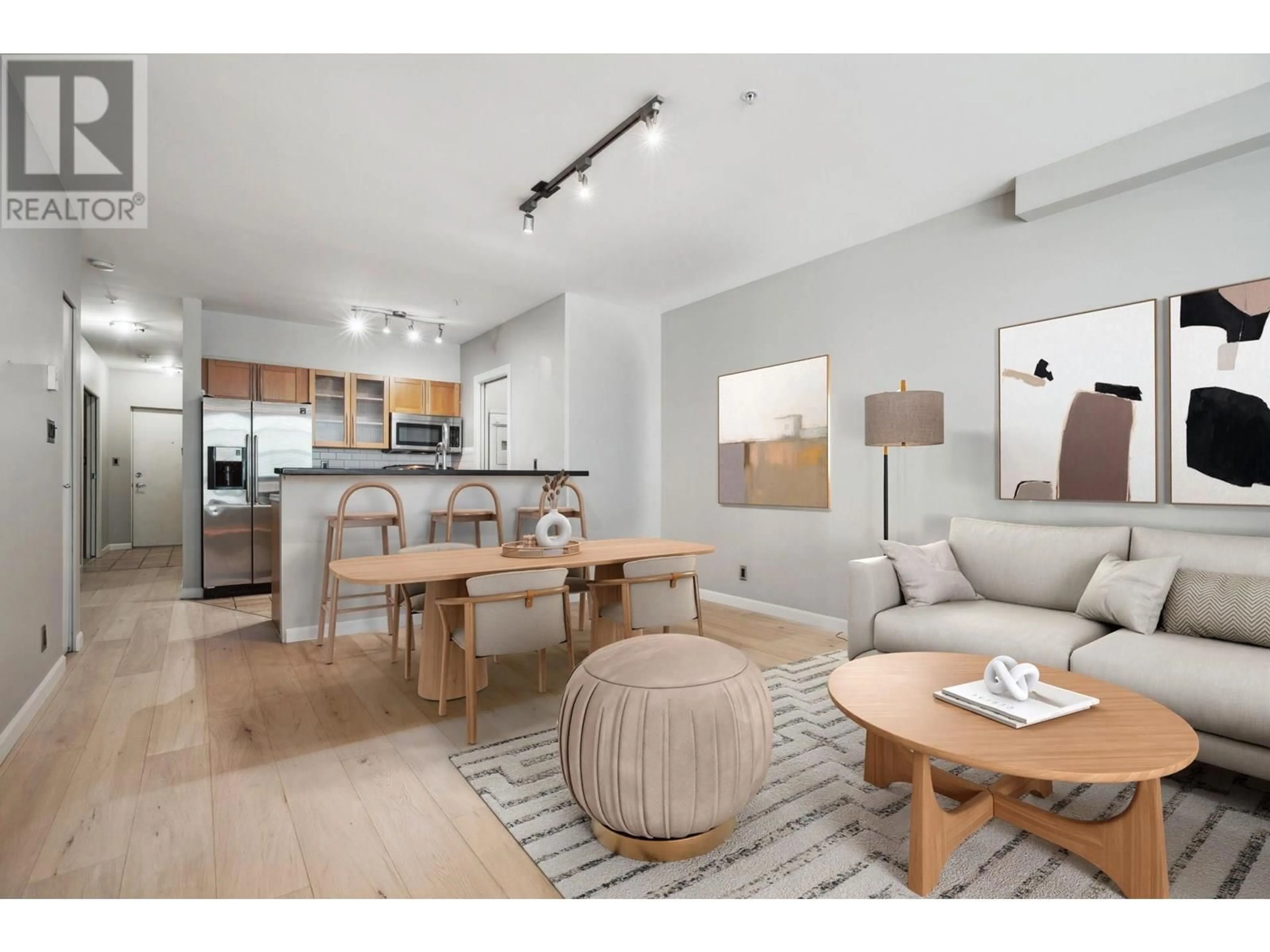 Living room with furniture, wood/laminate floor for 404 - 1688 CYPRESS STREET, Vancouver British Columbia V6J5J1
