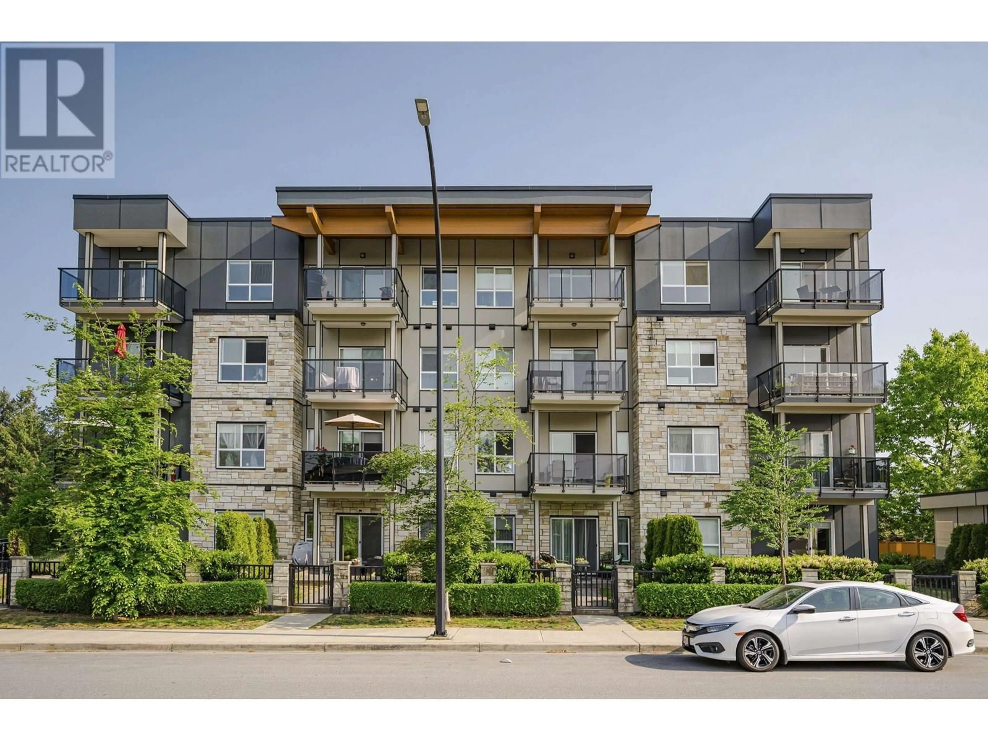 A pic from outside/outdoor area/front of a property/back of a property/a pic from drone, unknown for 302 - 12310 222 STREET, Maple Ridge British Columbia V2X5W7