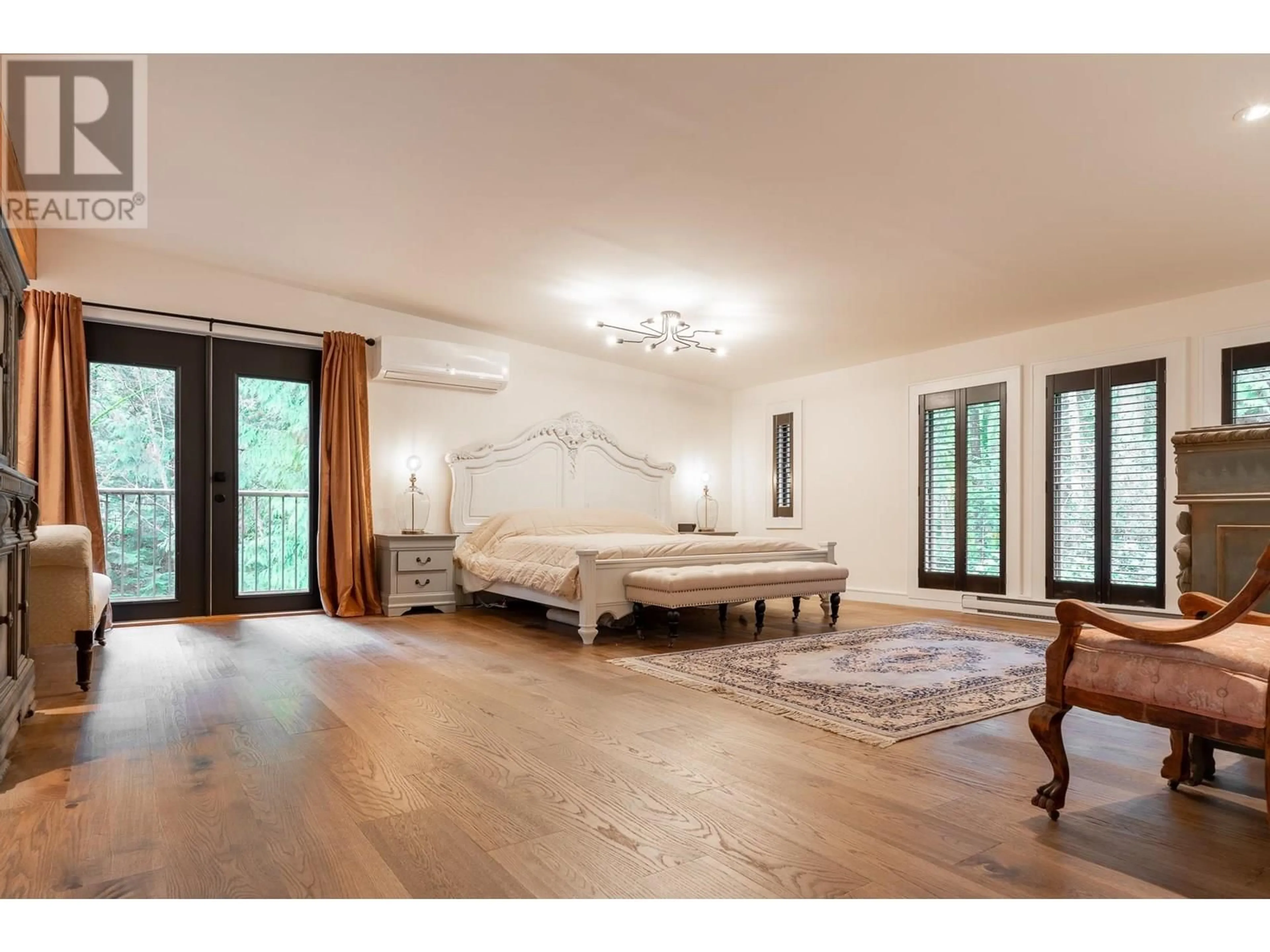 Bedroom with bed, wood/laminate floor for 943/937 STEWART ROAD, Gibsons British Columbia V0N1V7