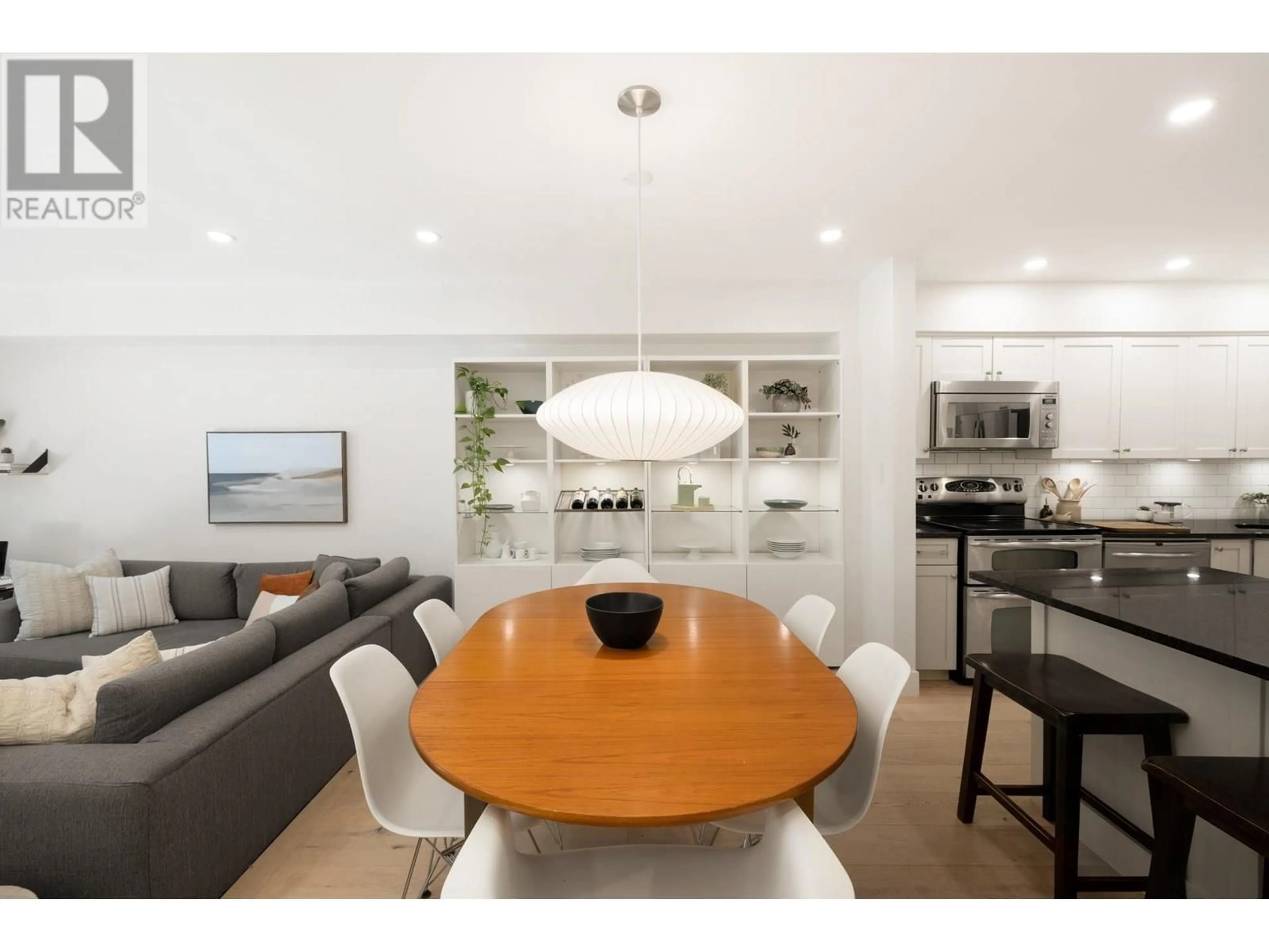 Open concept kitchen, wood/laminate floor for 3946 INDIAN RIVER DRIVE, North Vancouver British Columbia V7G2G9