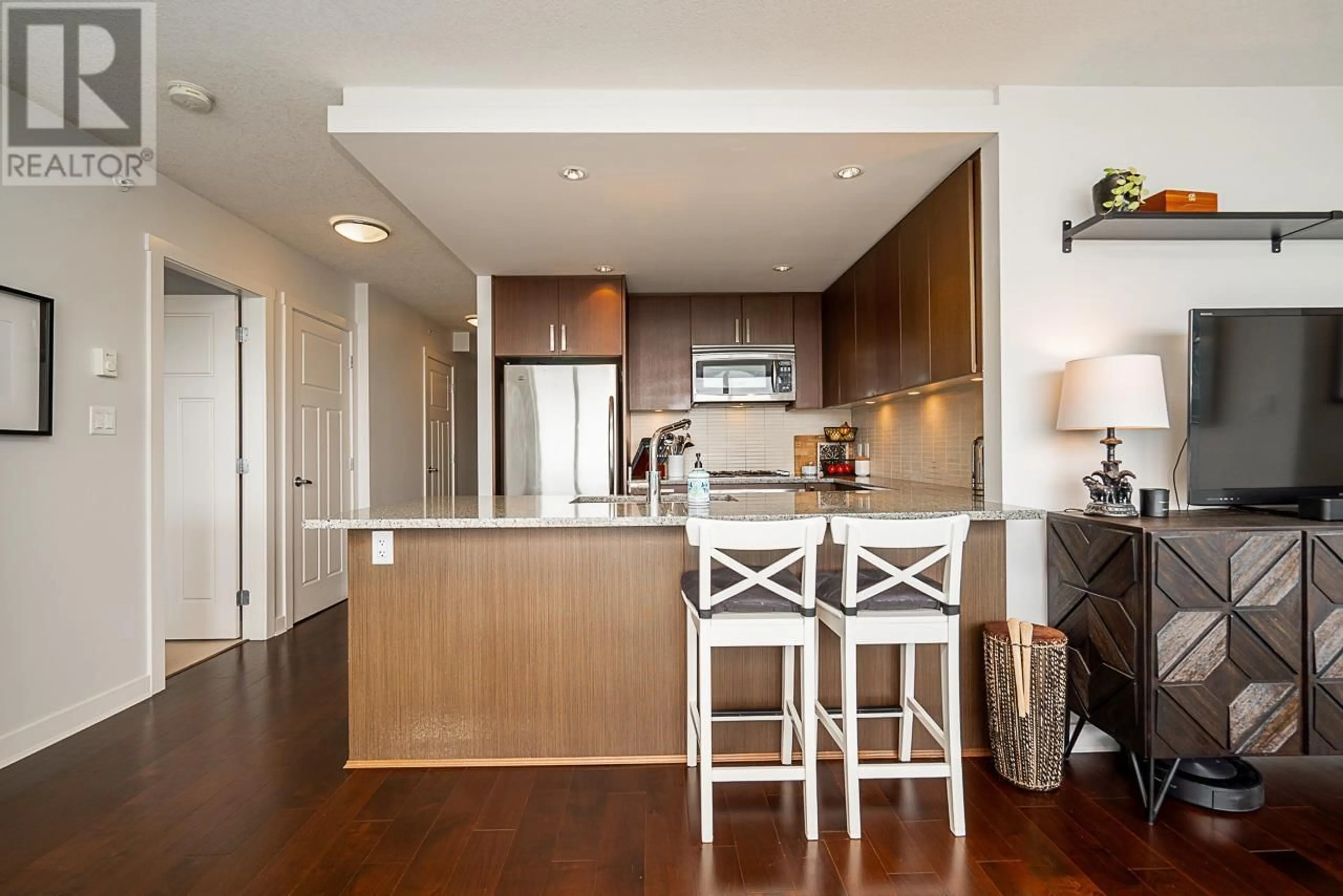 Open concept kitchen, wood/laminate floor for 2605 - 2978 GLEN DRIVE, Coquitlam British Columbia V3B0C3