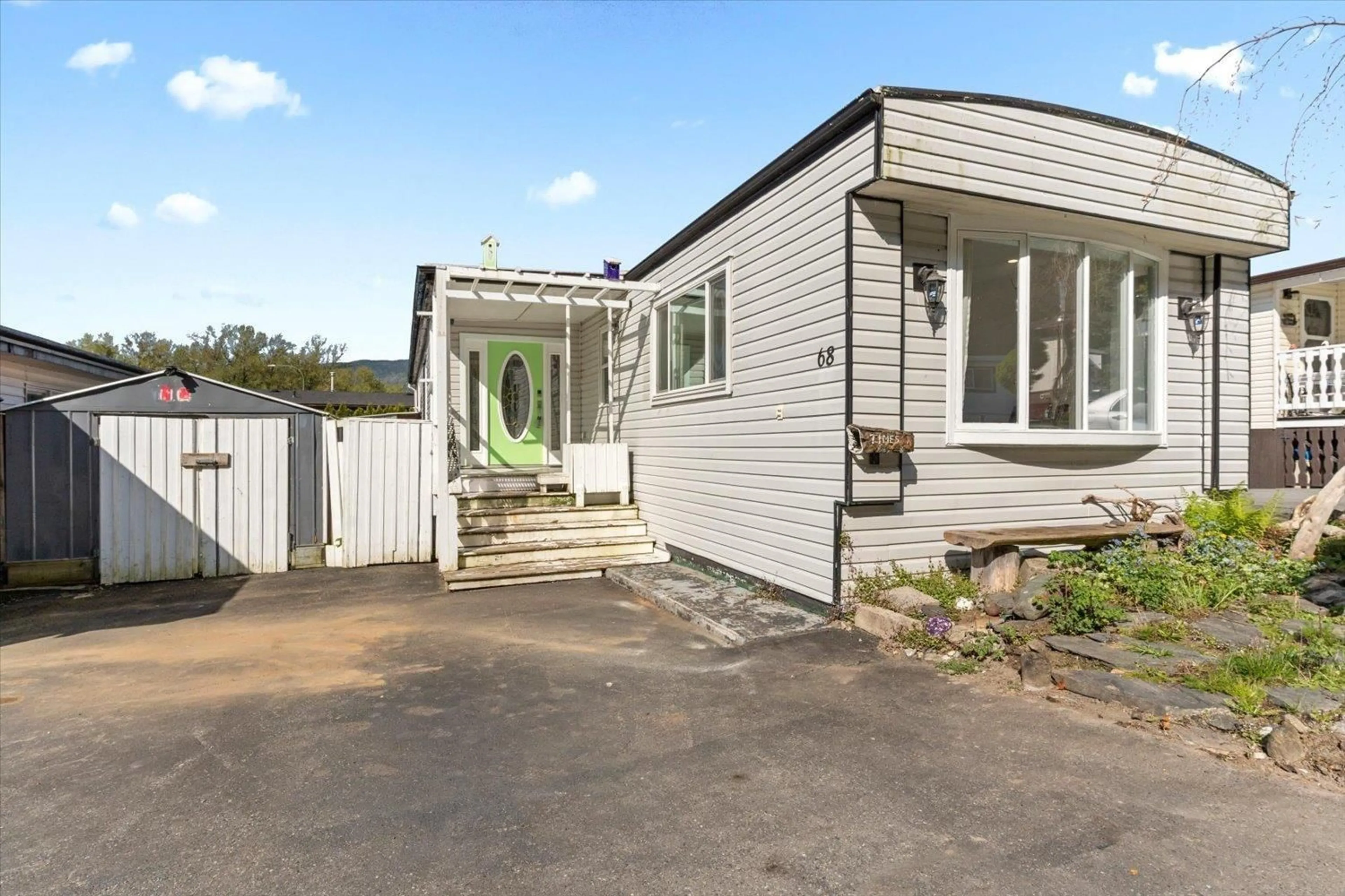 A pic from outside/outdoor area/front of a property/back of a property/a pic from drone, street for 68 - 46511 CHILLIWACK LAKE ROAD, Chilliwack British Columbia V2R3S3