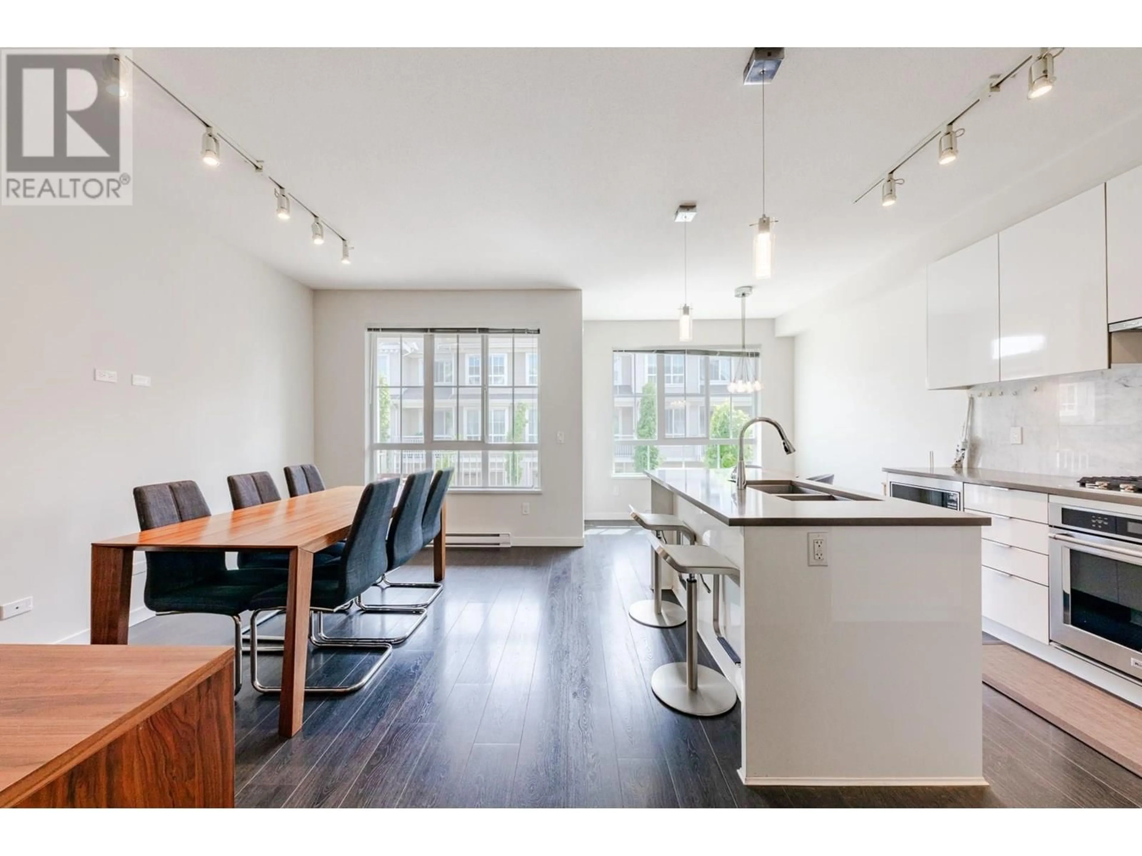 Open concept kitchen, wood/laminate floor for 54 - 5510 ADMIRAL WAY, Delta British Columbia V4K0C3