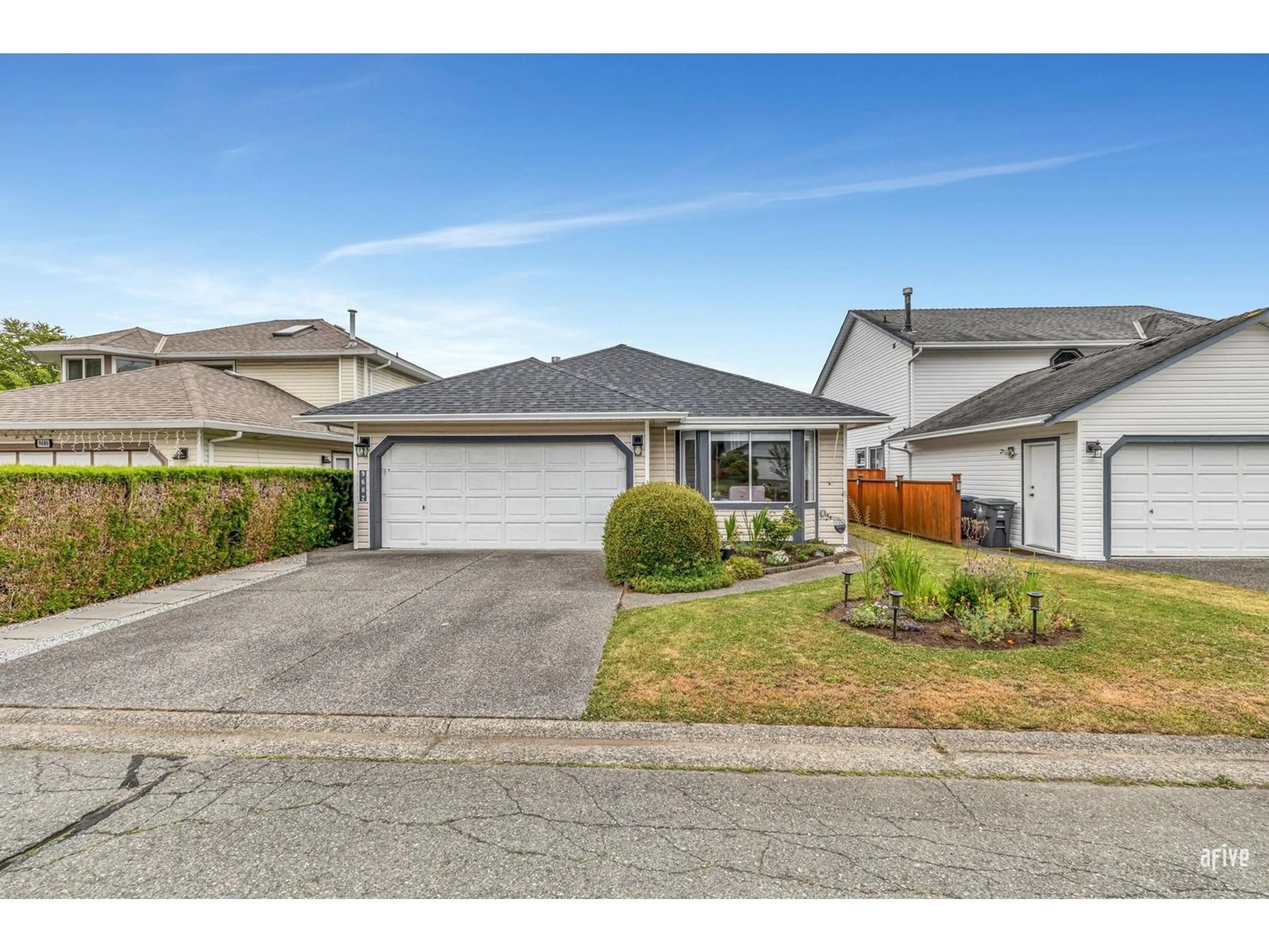 A pic from outside/outdoor area/front of a property/back of a property/a pic from drone, street for 9682 151A, Surrey British Columbia V3R9Z4
