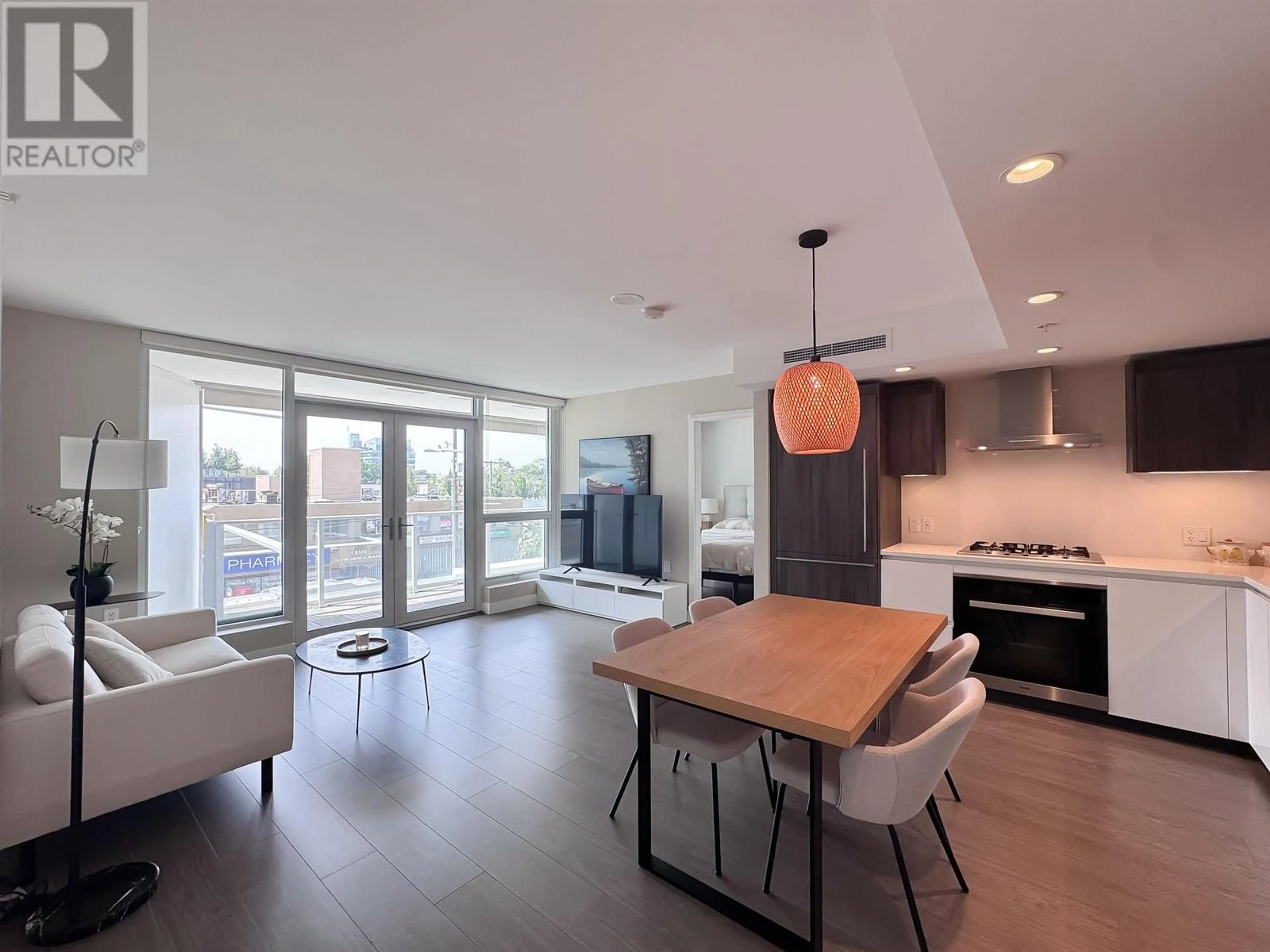 Open concept kitchen, wood/laminate floor for 314 - 8133 COOK ROAD, Richmond British Columbia V6Y0L7