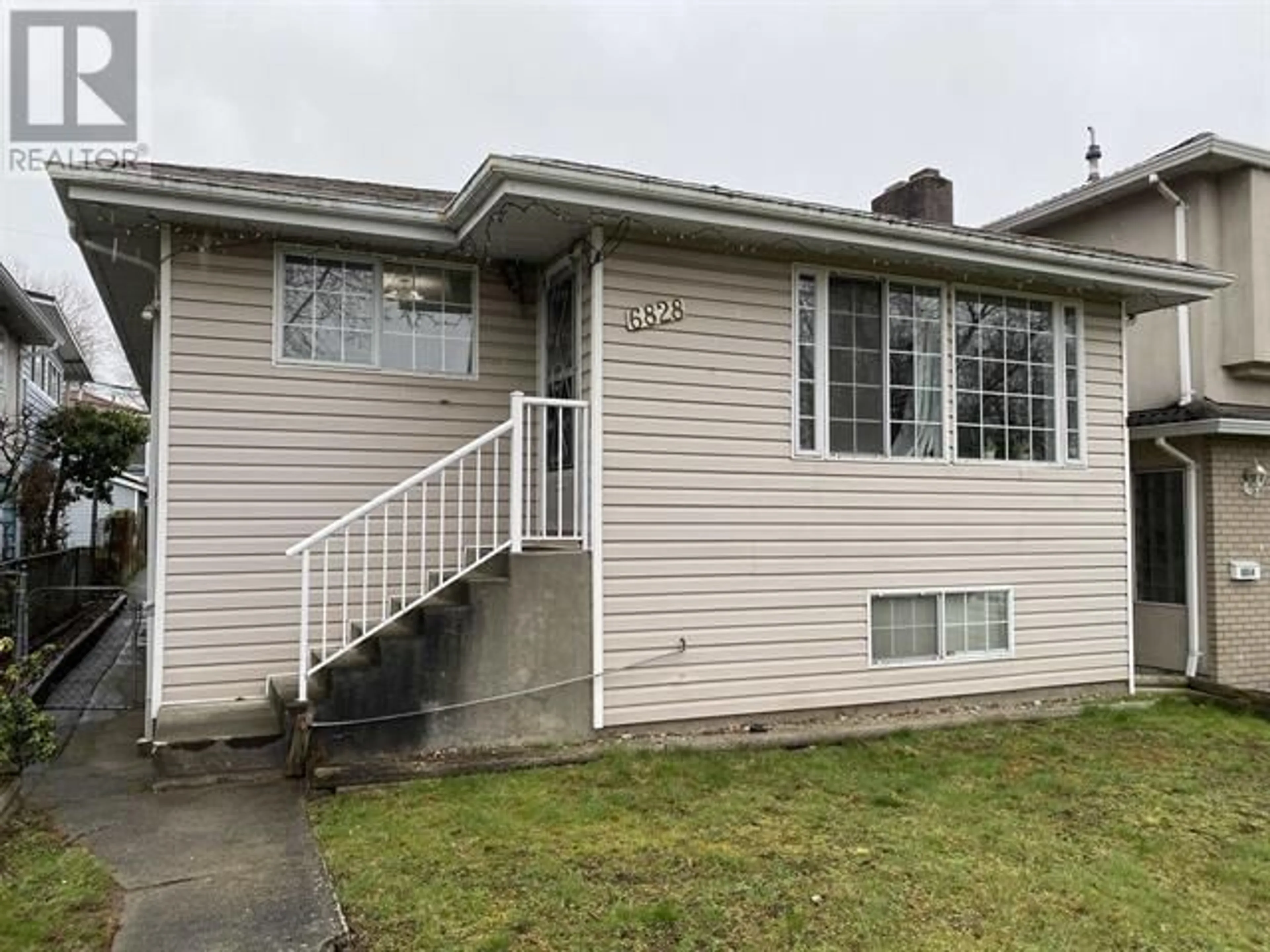 Home with vinyl exterior material, street for 6828 INVERNESS STREET, Vancouver British Columbia V5X4G2