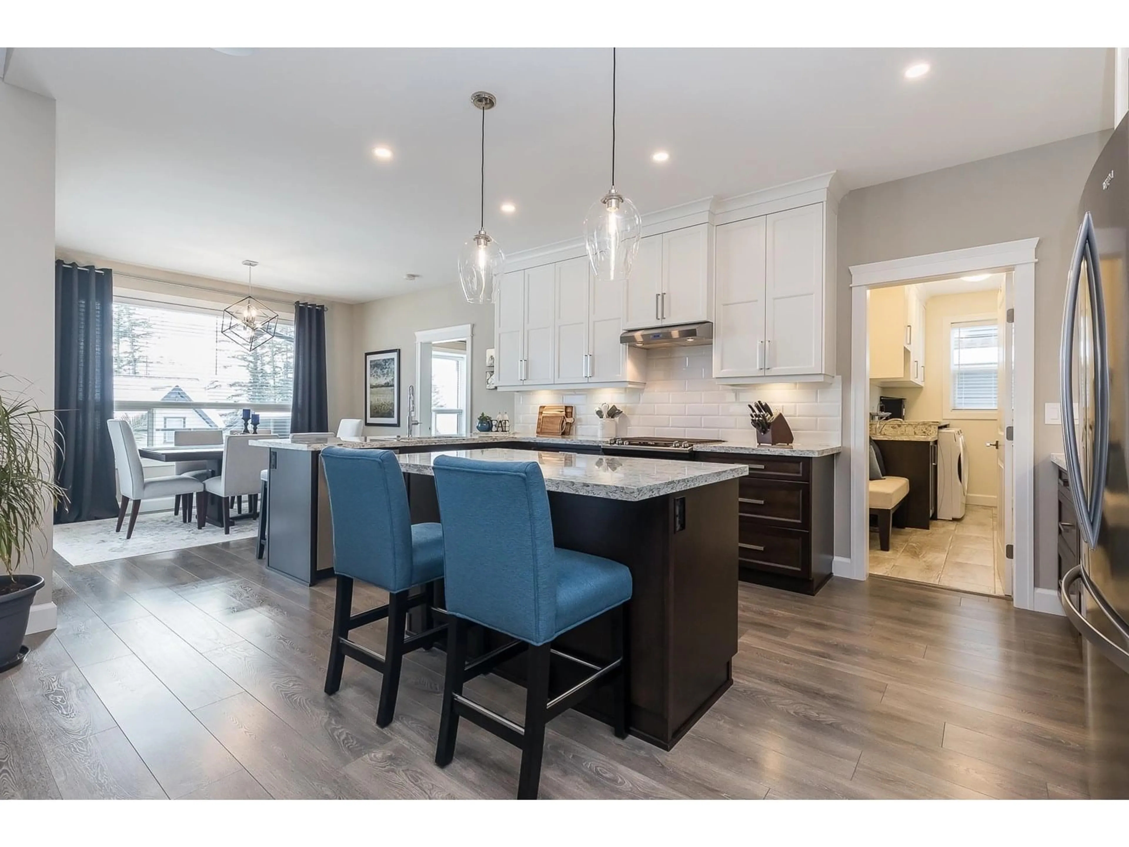Open concept kitchen, wood/laminate floor for 1324 STROMDAHL PLACE, Agassiz British Columbia V0M1A1