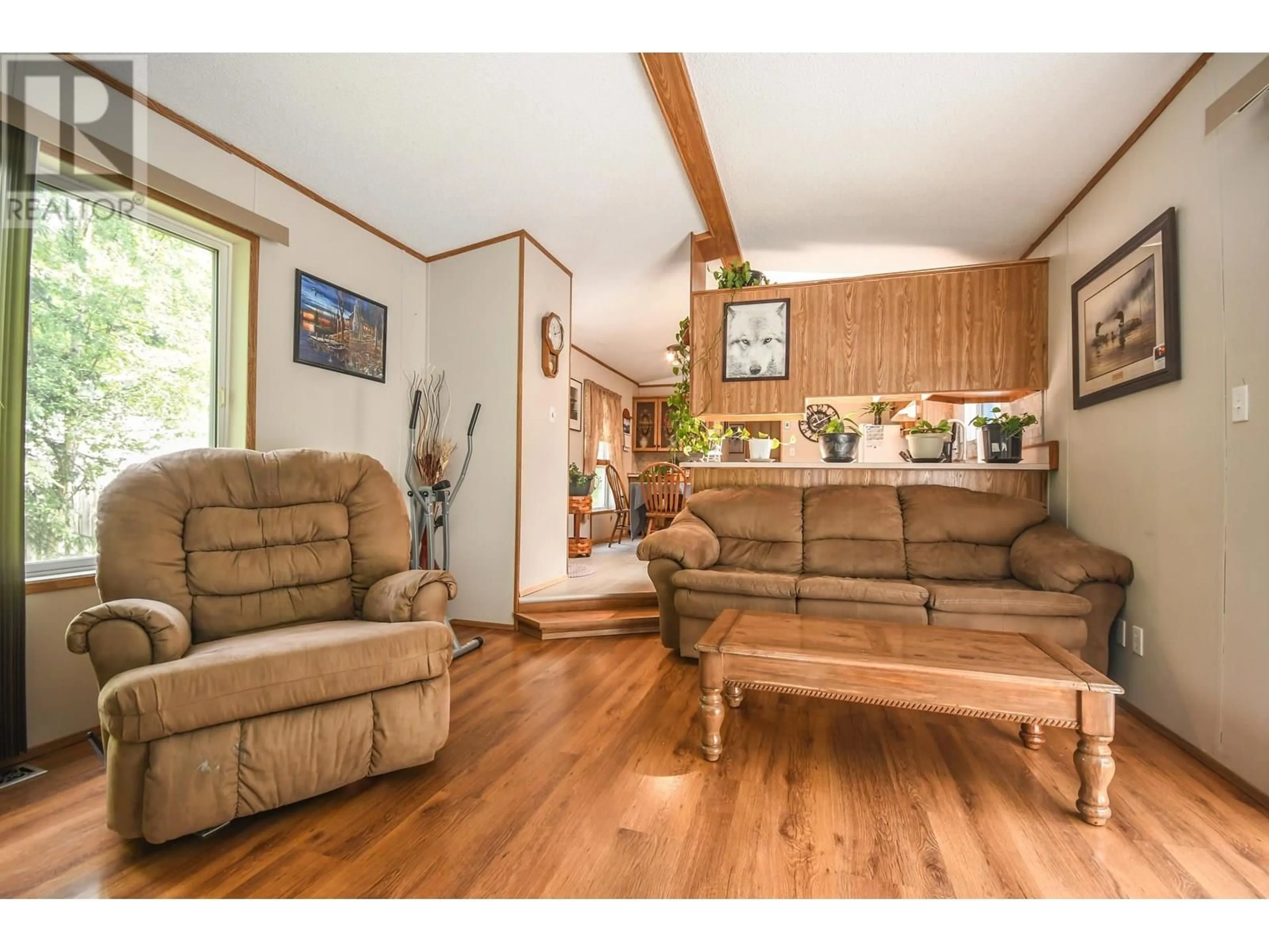 Living room with furniture, wood/laminate floor for 2925 MINOTTI DRIVE, Prince George British Columbia V2K3S6