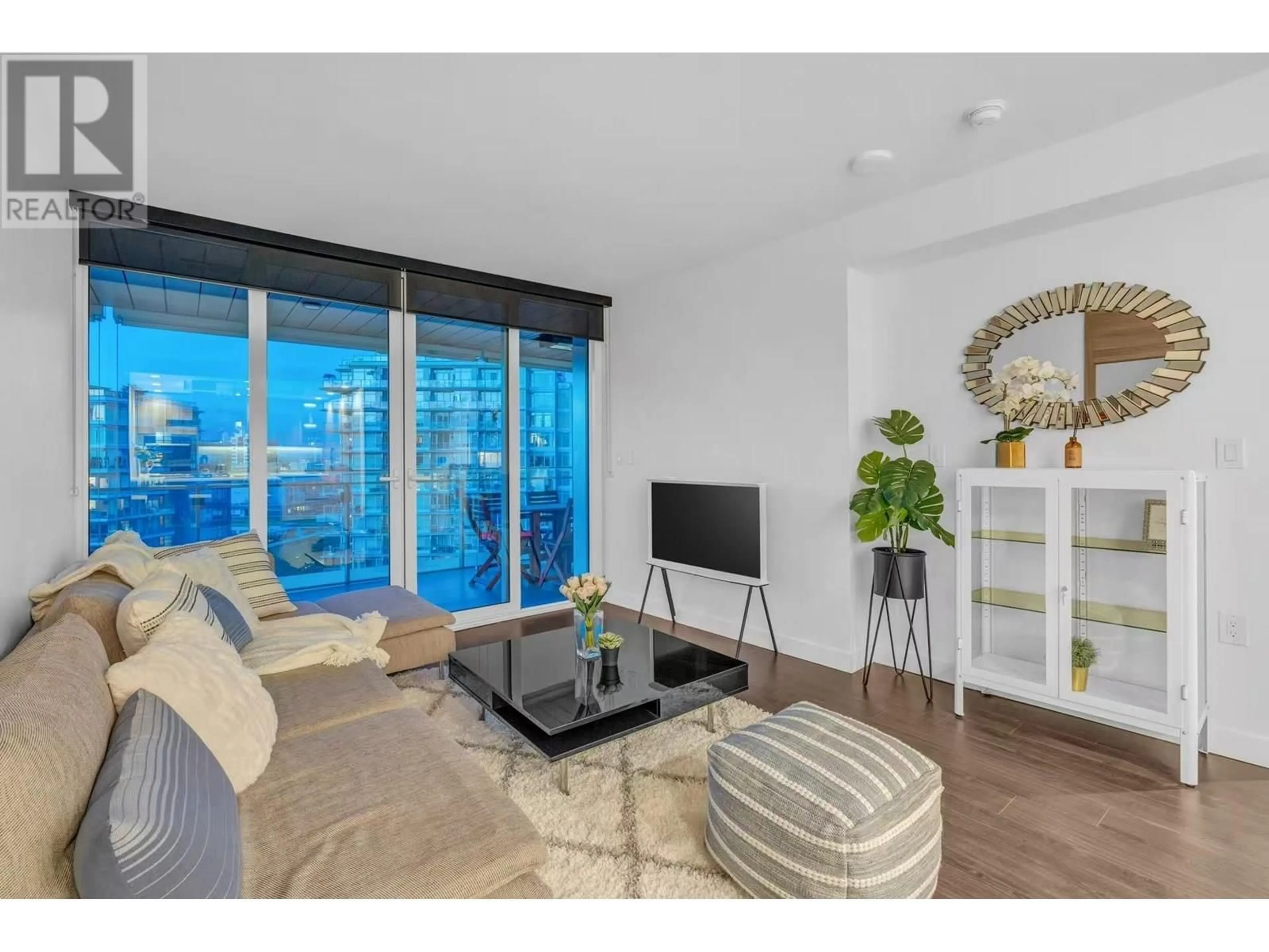 Living room with furniture, wood/laminate floor for 1207 - 1768 COOK STREET, Vancouver British Columbia V5Y0N3