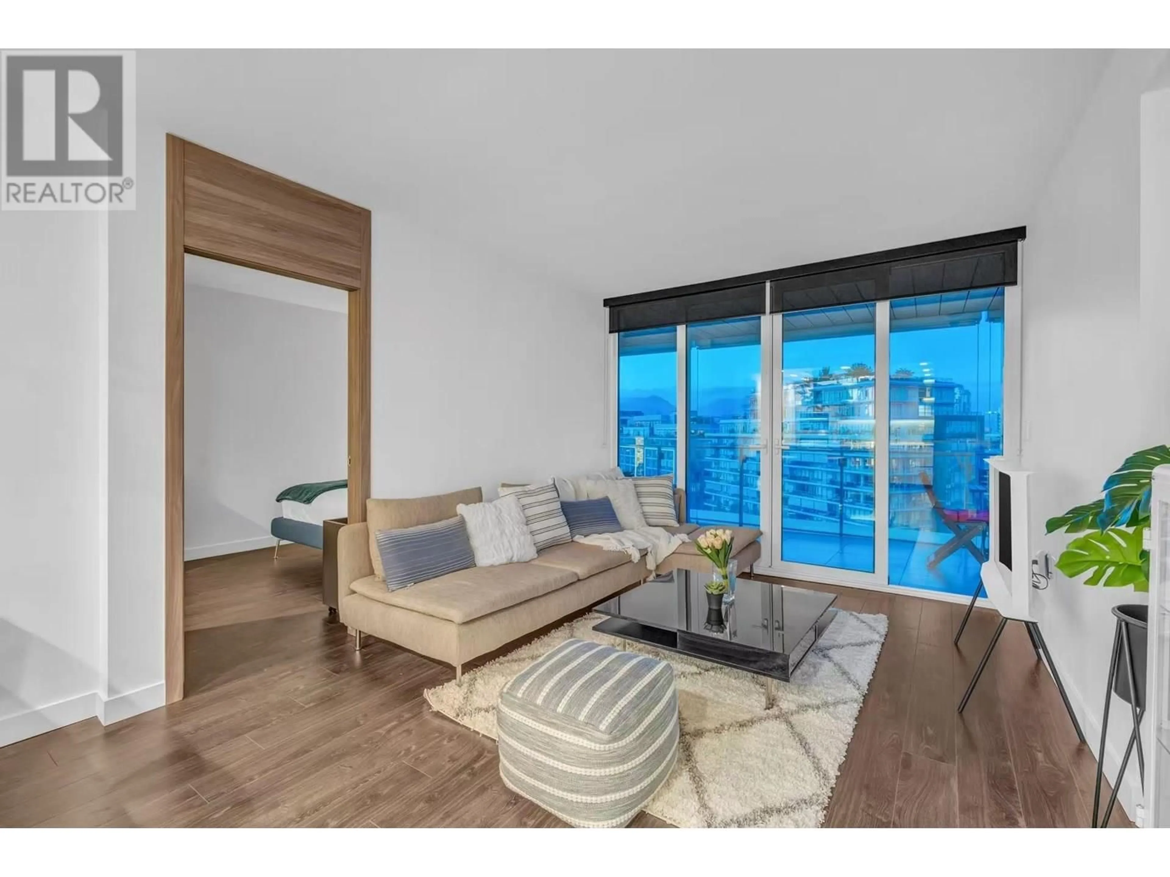 Living room with furniture, wood/laminate floor for 1207 - 1768 COOK STREET, Vancouver British Columbia V5Y0N3