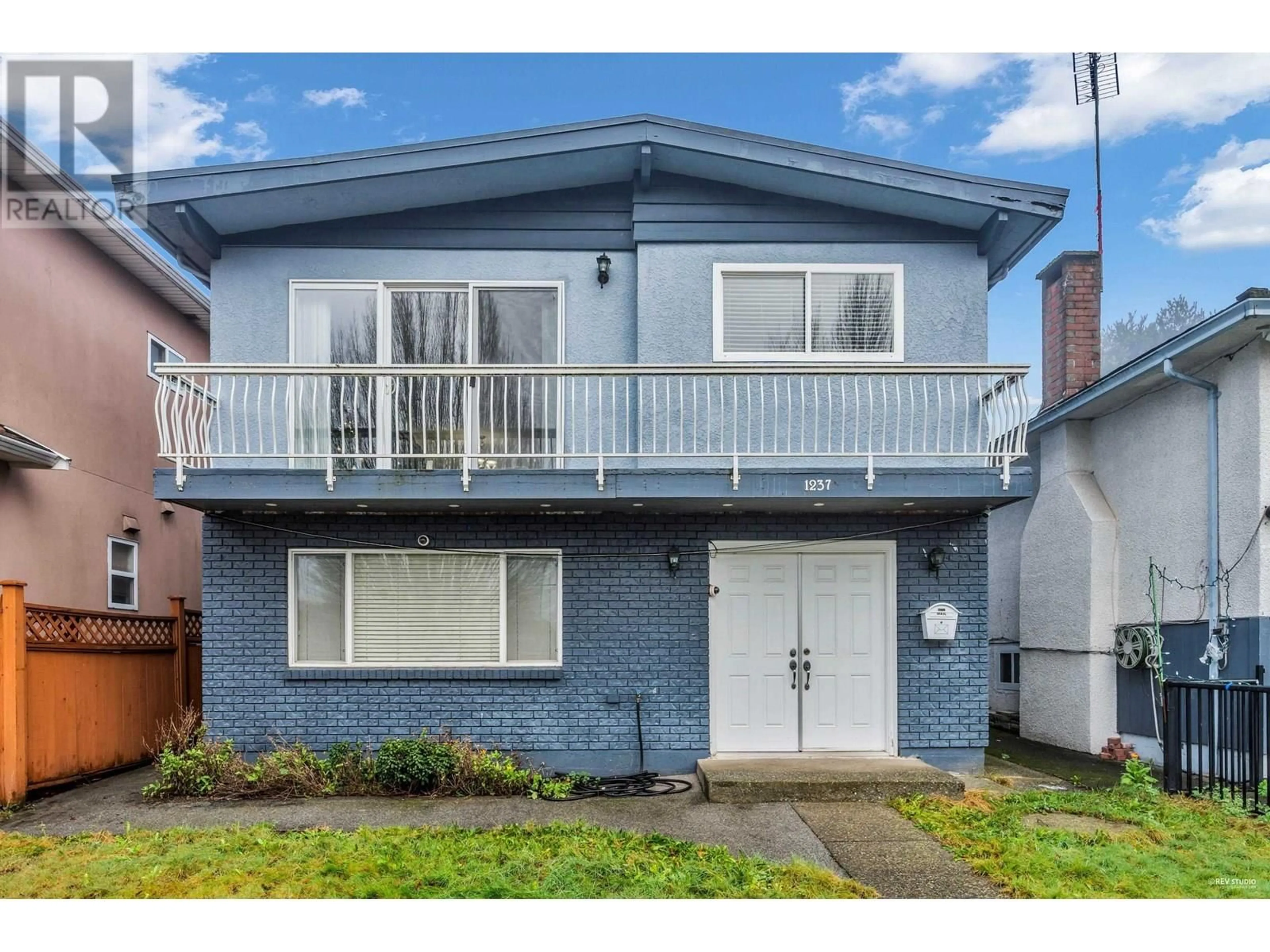 Home with vinyl exterior material, street for 1237 64TH AVENUE, Vancouver British Columbia V5X2N8