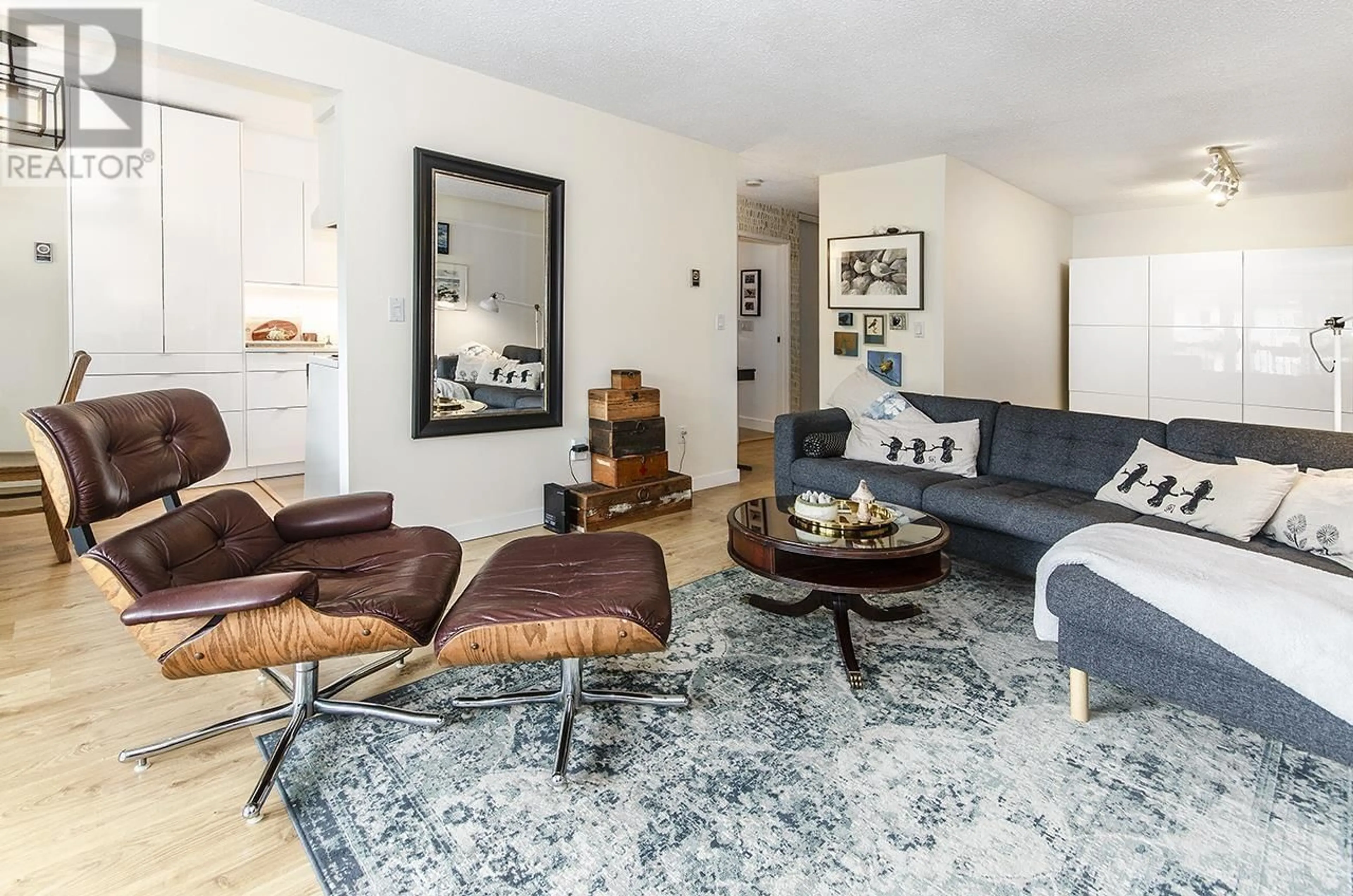 Living room with furniture, unknown for 202 - 105 KINGS ROAD, North Vancouver British Columbia V7N2L7