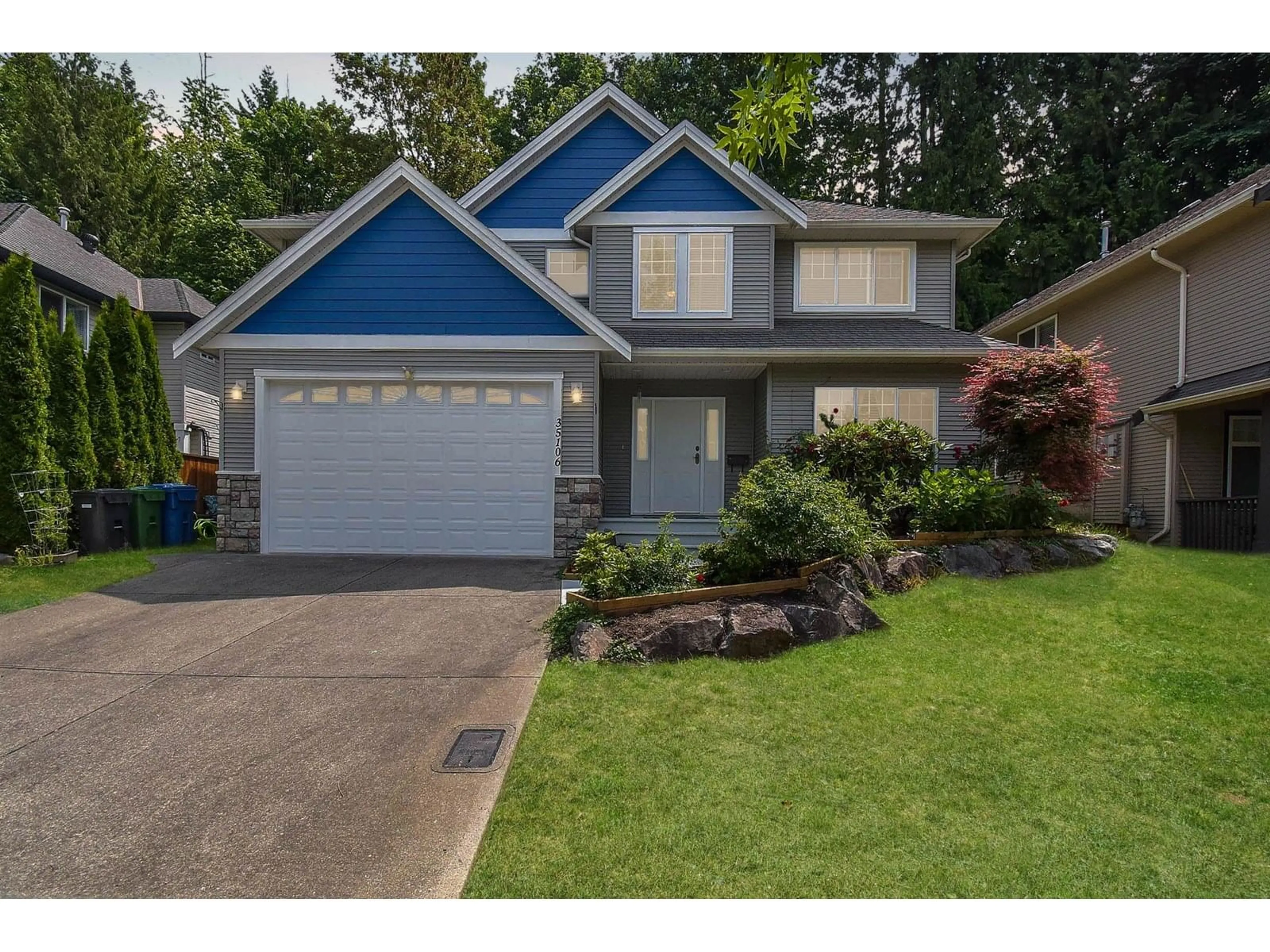 Home with vinyl exterior material, street for 35106 LABURNUM, Abbotsford British Columbia V2S8K3