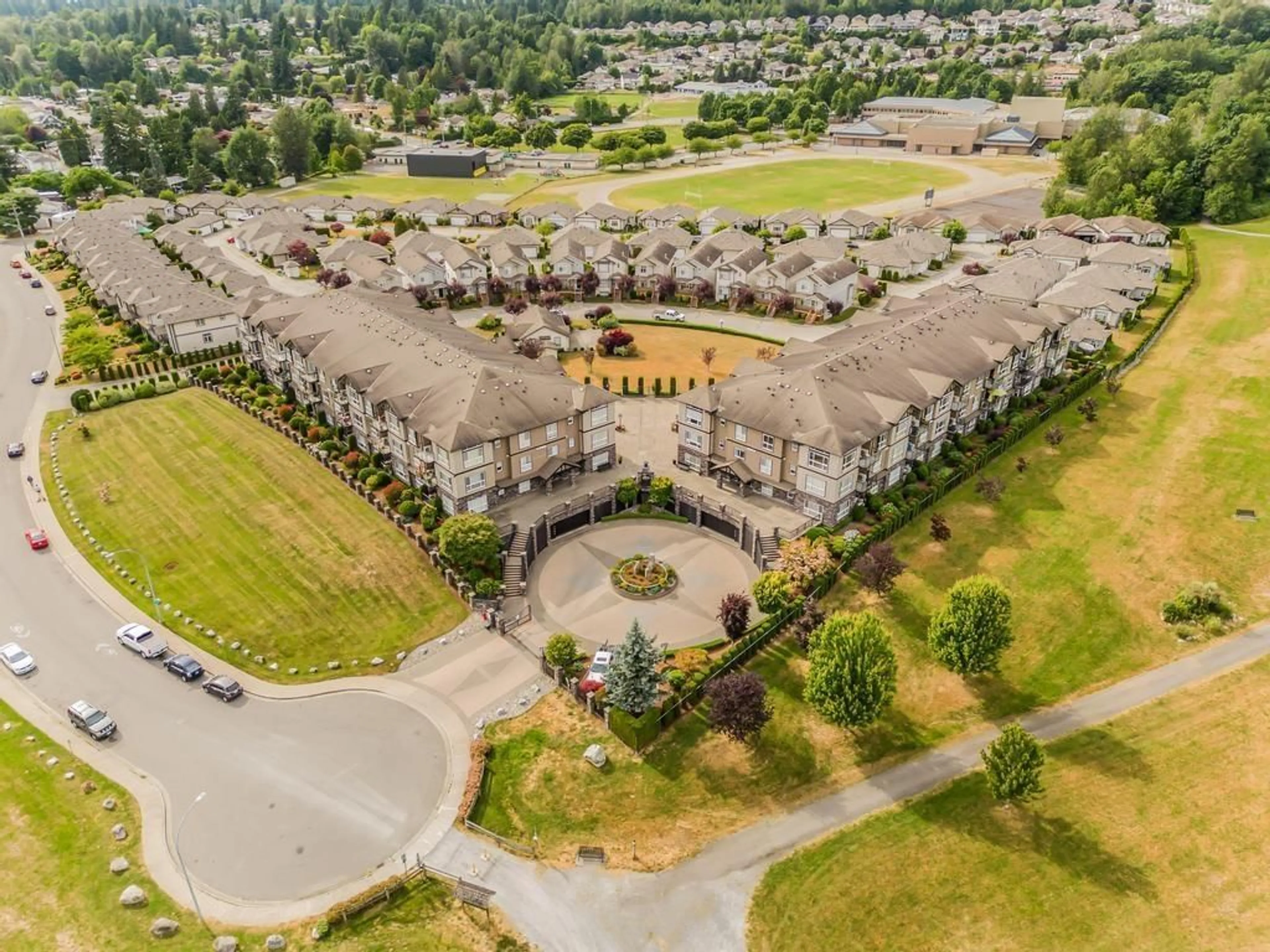A pic from outside/outdoor area/front of a property/back of a property/a pic from drone, mountain view for B311 - 33755 7TH, Mission British Columbia V2V0A4