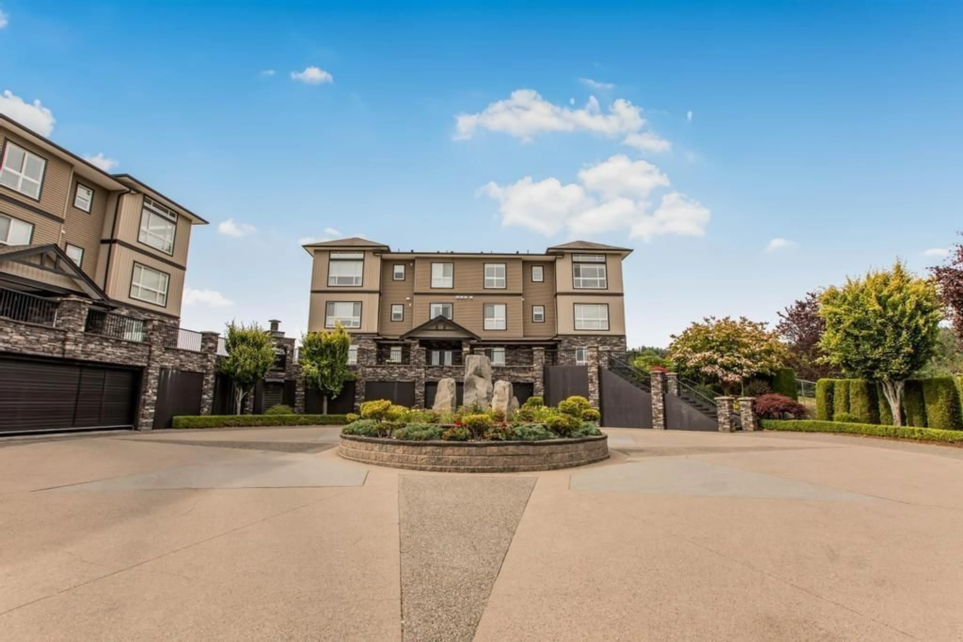 A pic from outside/outdoor area/front of a property/back of a property/a pic from drone, unknown for B311 - 33755 7TH, Mission British Columbia V2V0A4