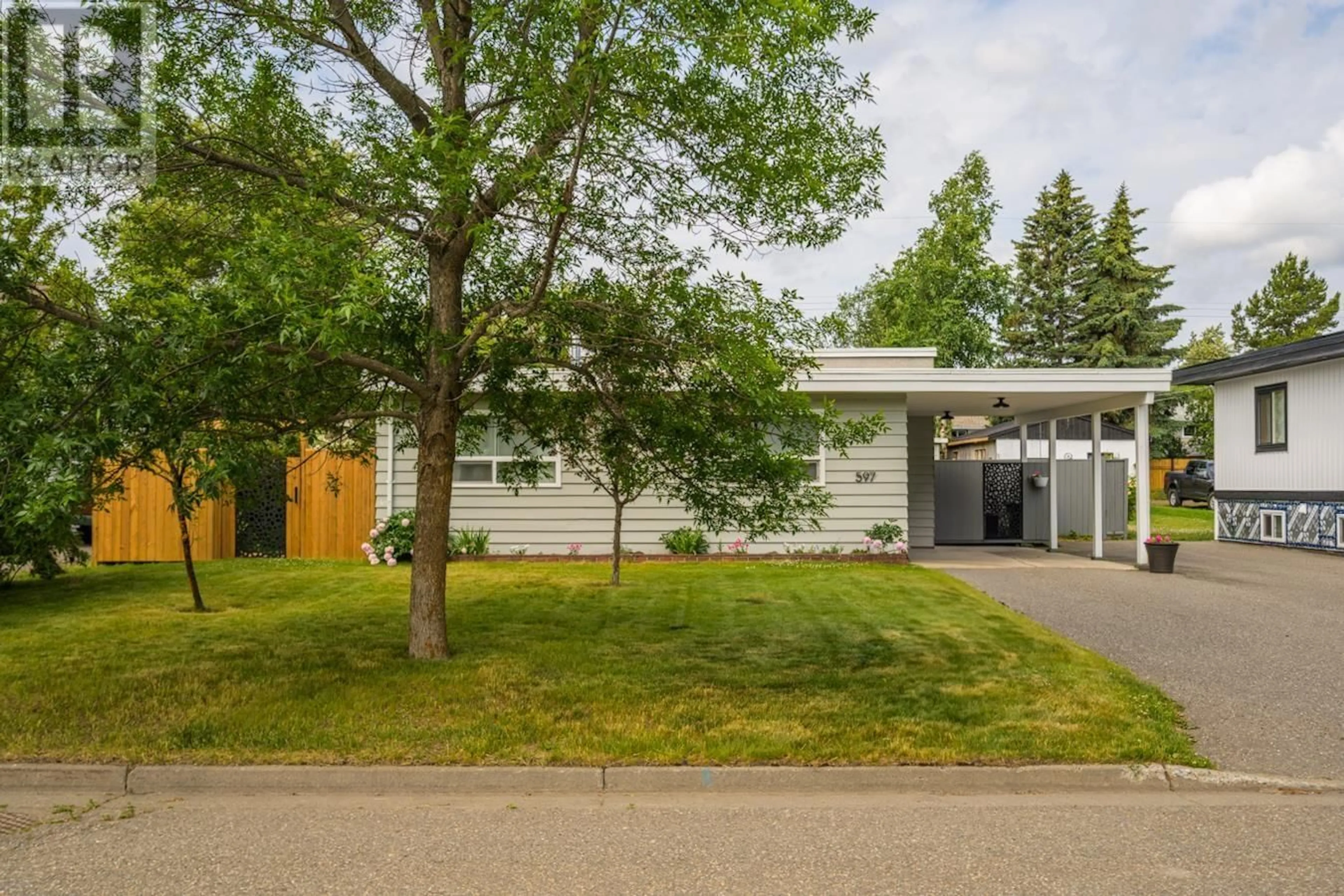 Home with vinyl exterior material, street for 597 DOUGLAS STREET, Prince George British Columbia V2M2M5