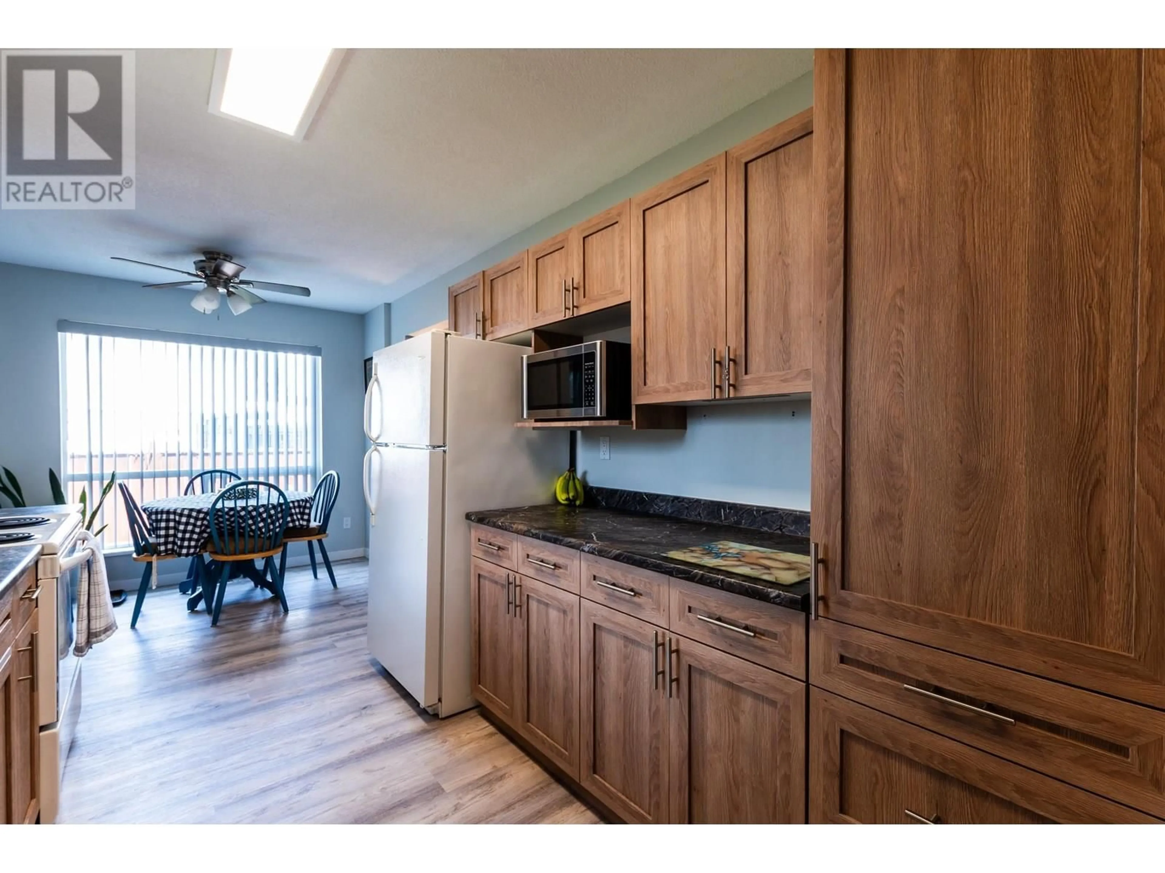Standard kitchen, wood/laminate floor for 101 - 1930 4TH AVENUE, Prince George British Columbia V2M7B2